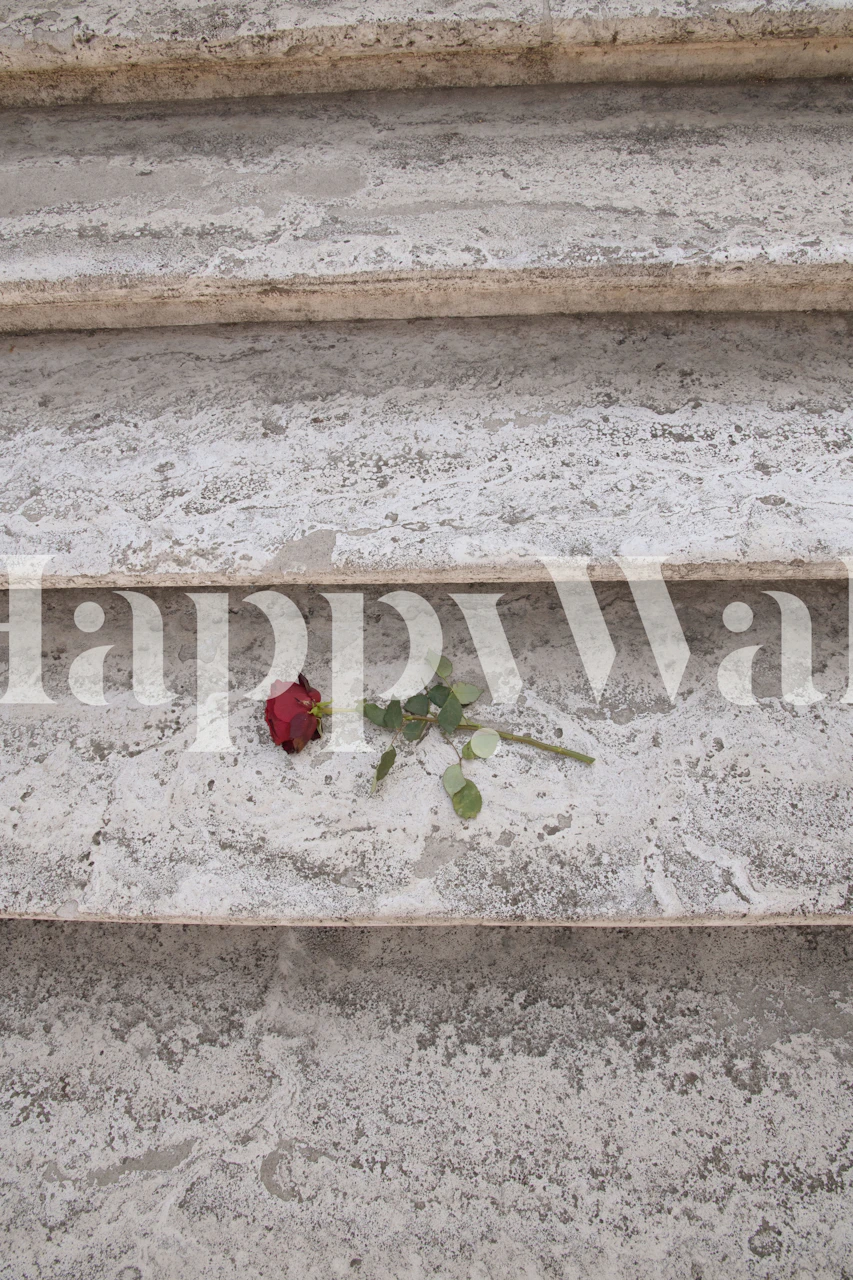 Marble texture with a red rose and green stem wallpaper