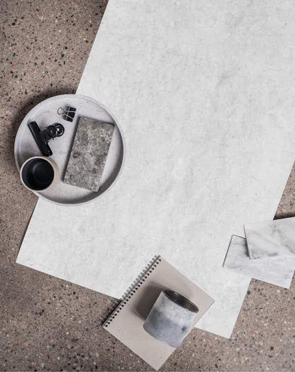 Soft gray concrete wallpaper roll