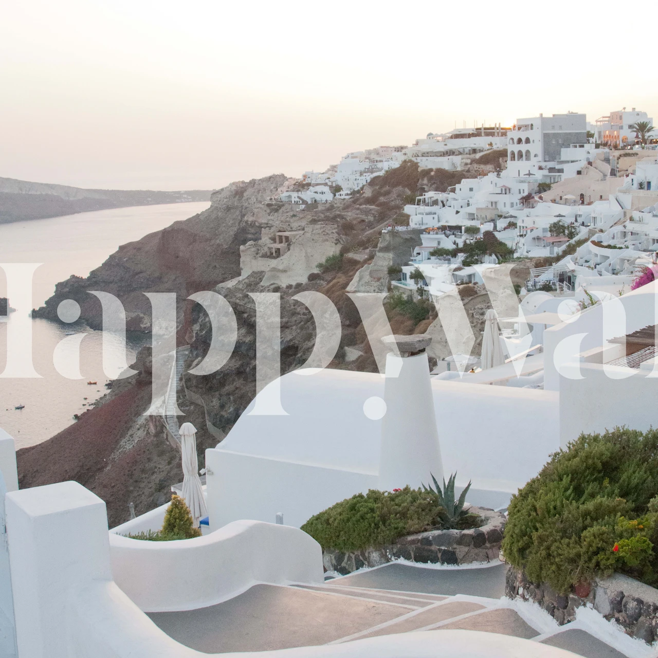 Santorini fototapet med vit arkitektur och solnedgång