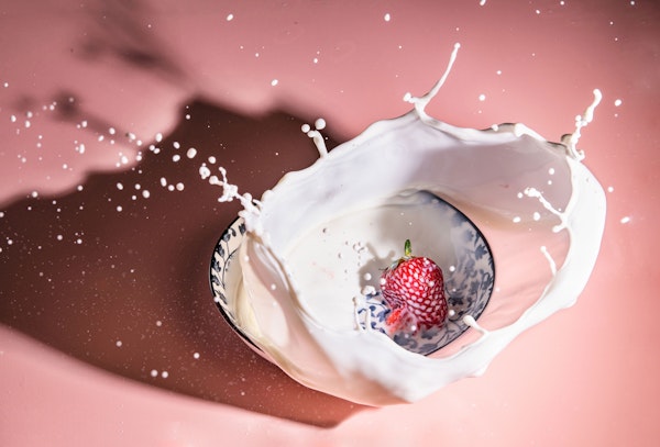 Strawberry fall into the milk trap