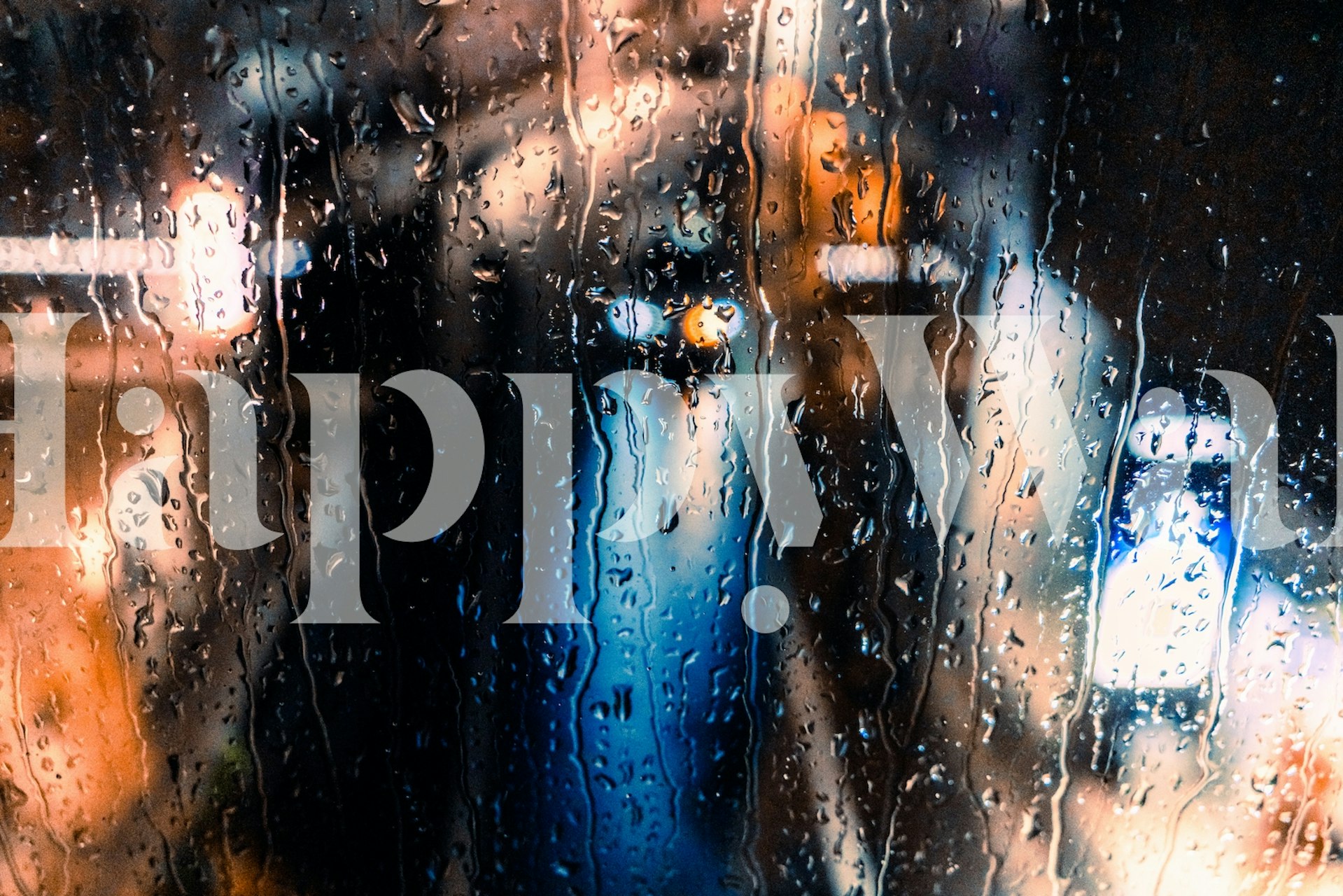 Rain Drops wall mural depicting the serene beauty of rain on glass with cool blue and earth tones.