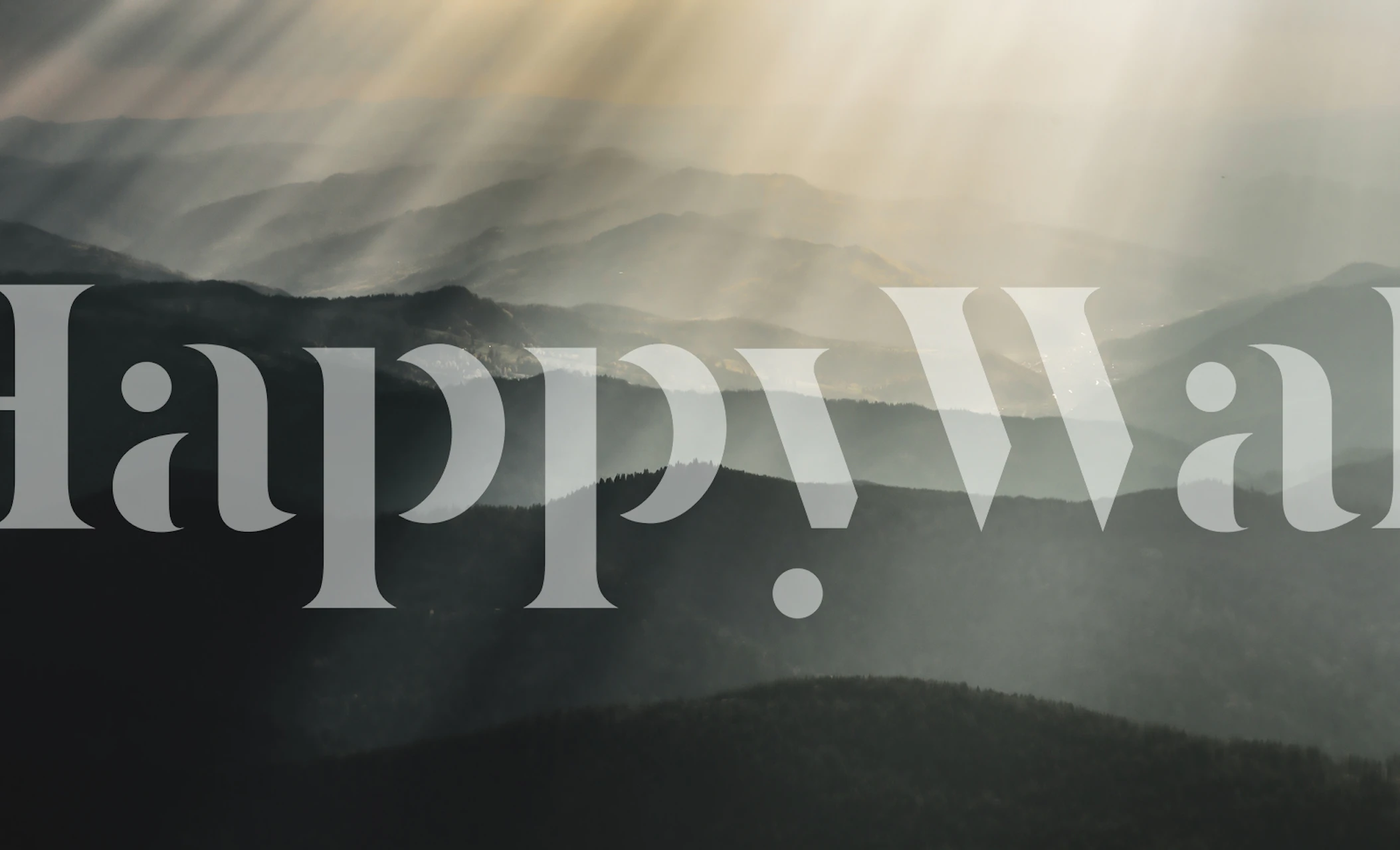 Mountain landscape with light rays in gray and blue tones wallpaper