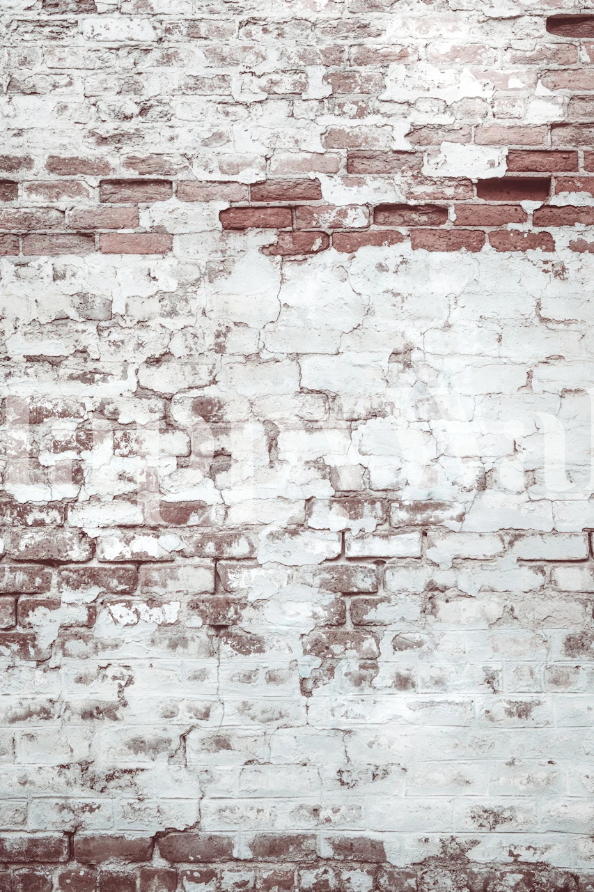 Light brick wall texture in pale colors wallpaper
