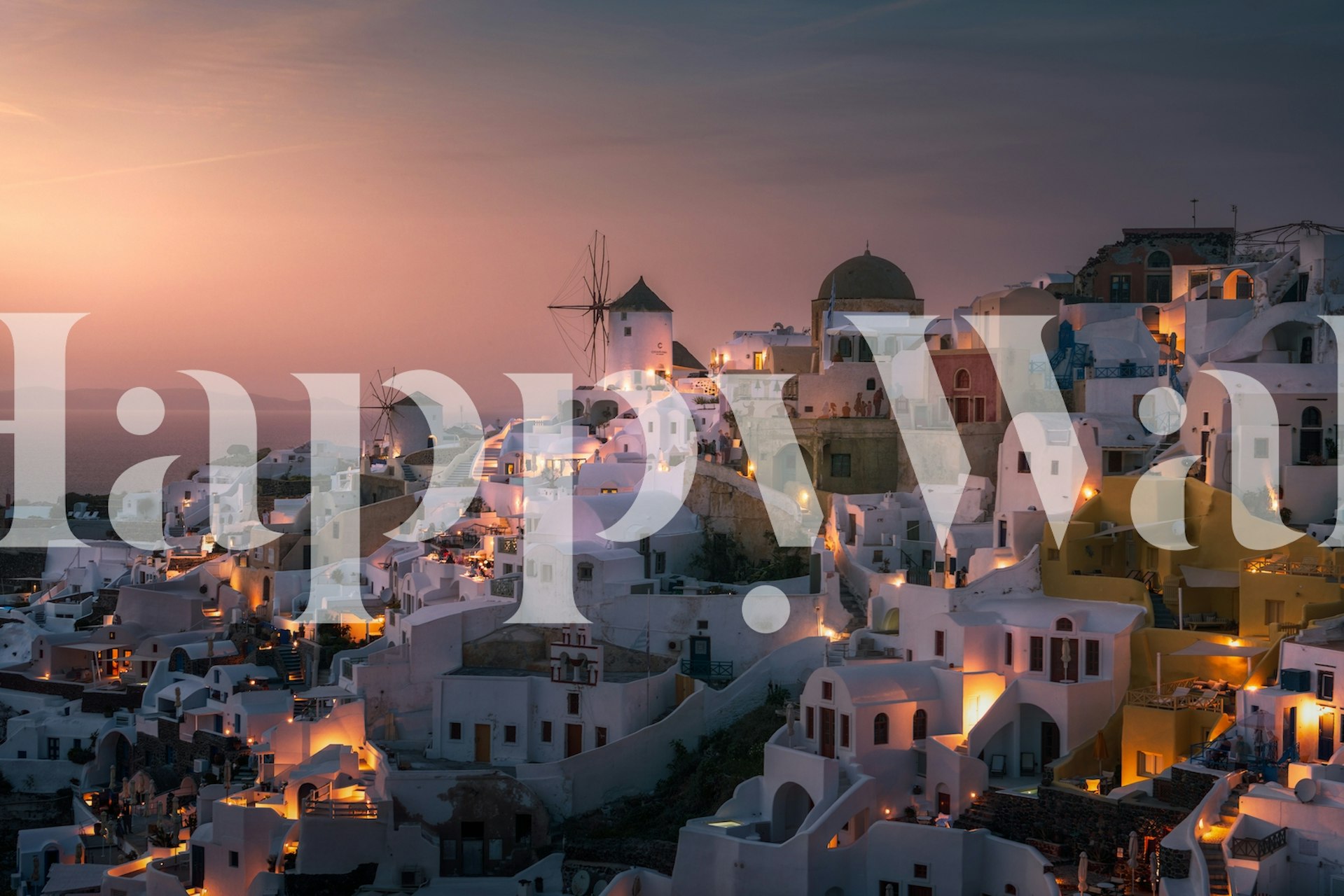 Santorini sunset view wall mural featuring white buildings and windmills