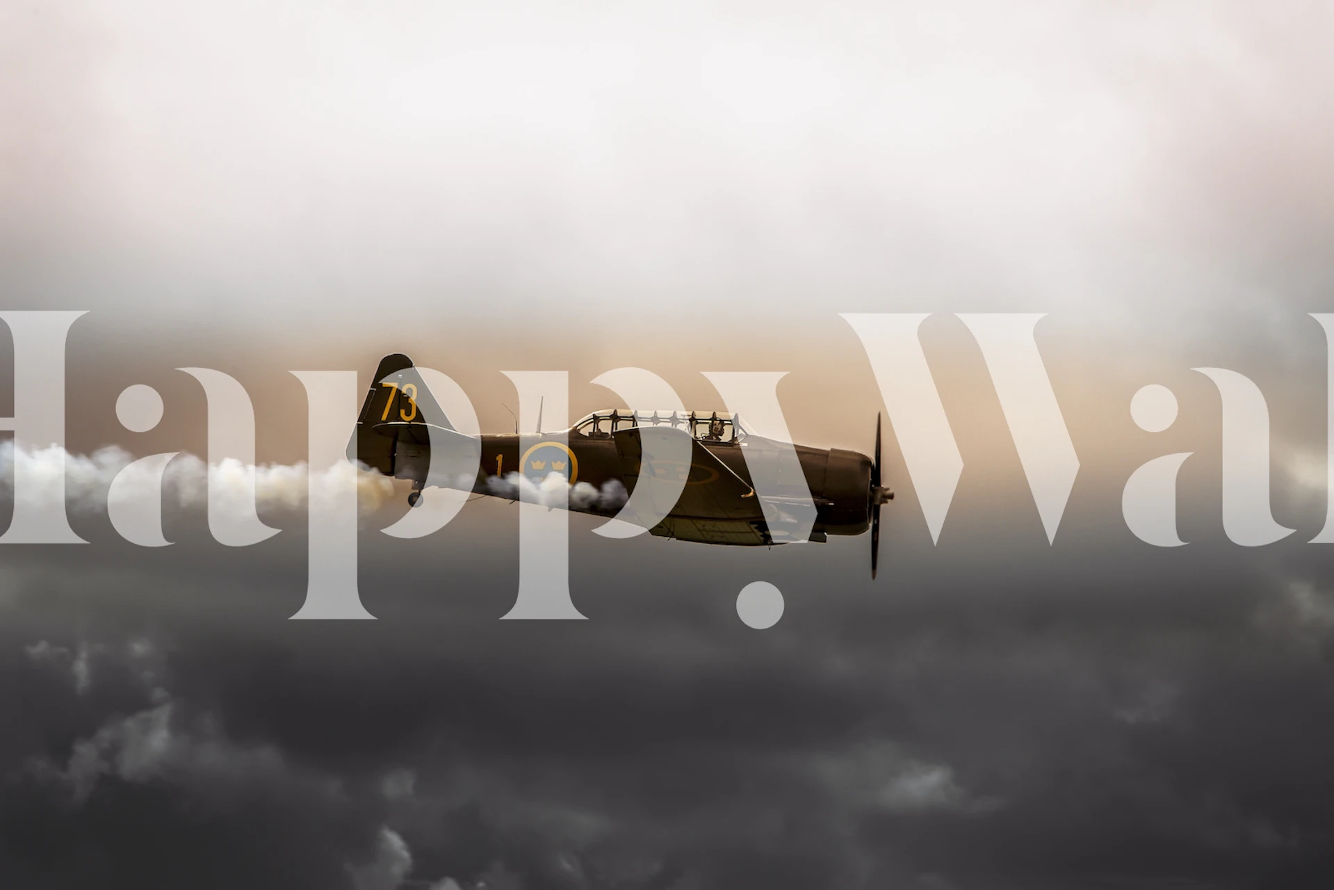 Vintage airplane flying through cloudy sky wallpaper