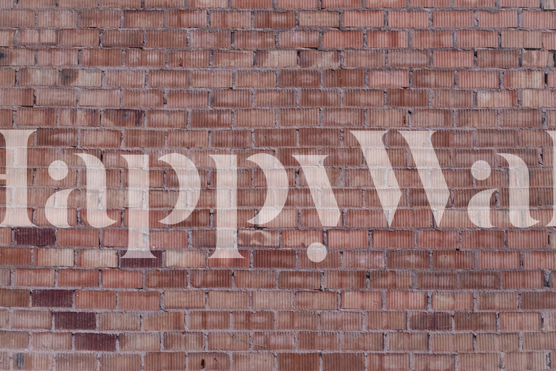 Textured brick wall mural with warm terracotta and dusky rose tones