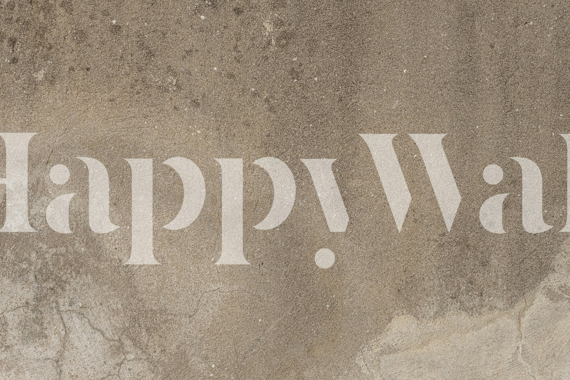 Neutraalin sävyinen kivikuvioinen seinämaalaus rauhalliseen sisustukseen