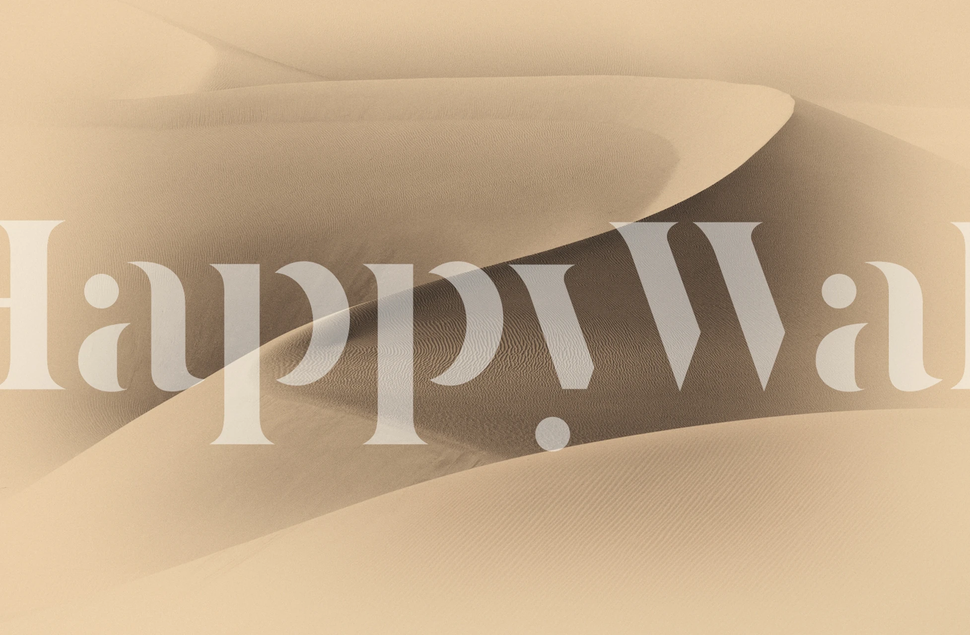 Sandy dunes with smooth curves and soft shadows wallpaper