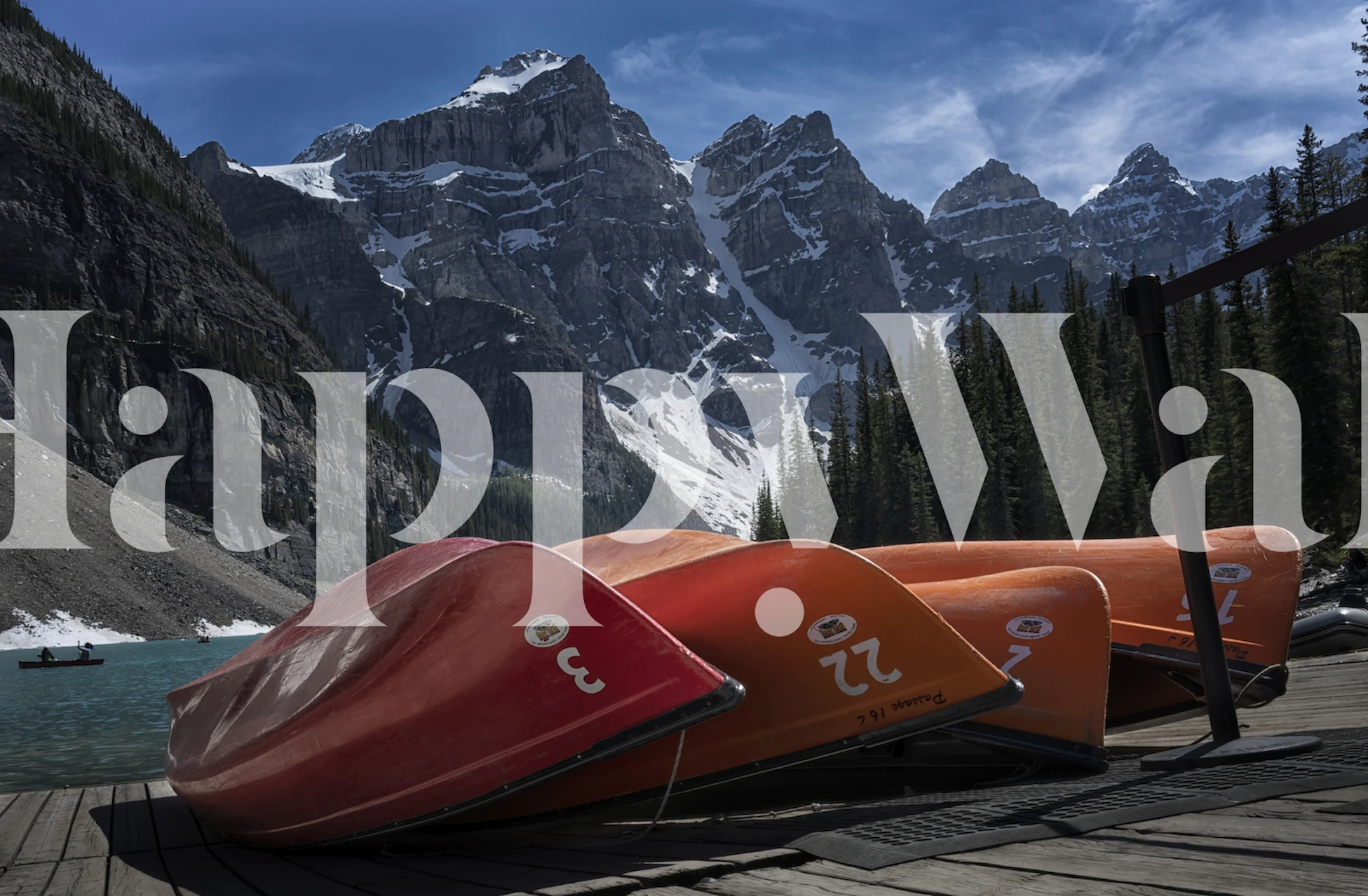 Four Peaks mountain landscape with red canoes wall mural