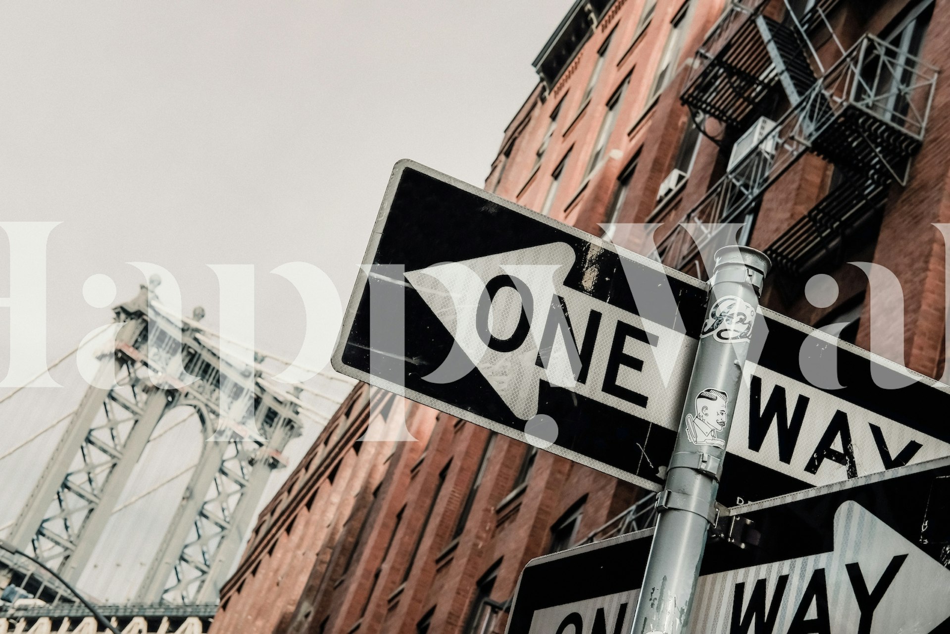 Street sign with 'ONE WAY' on urban background wallpaper