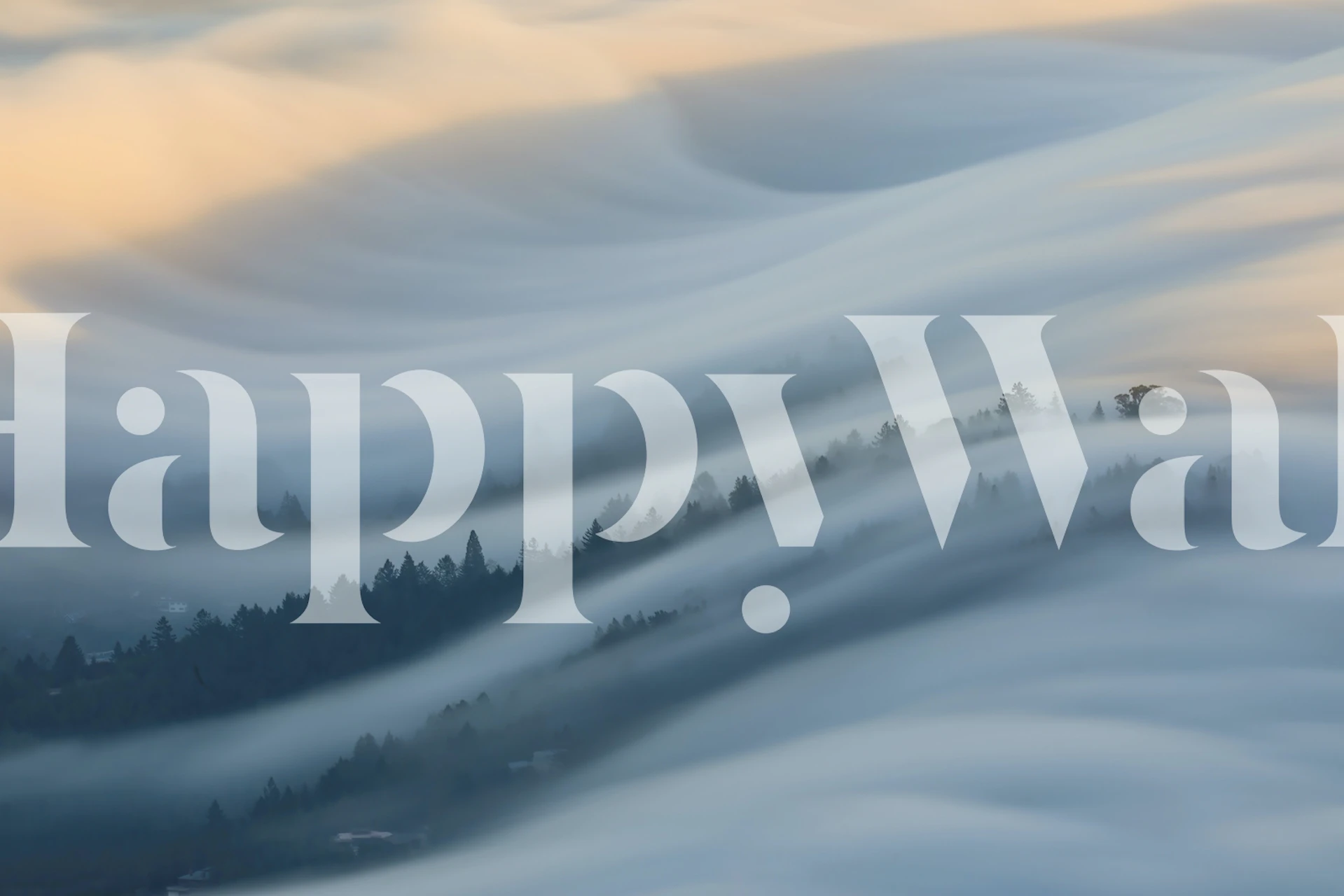 Foggy landscape with rolling waves of gray and white wallpaper