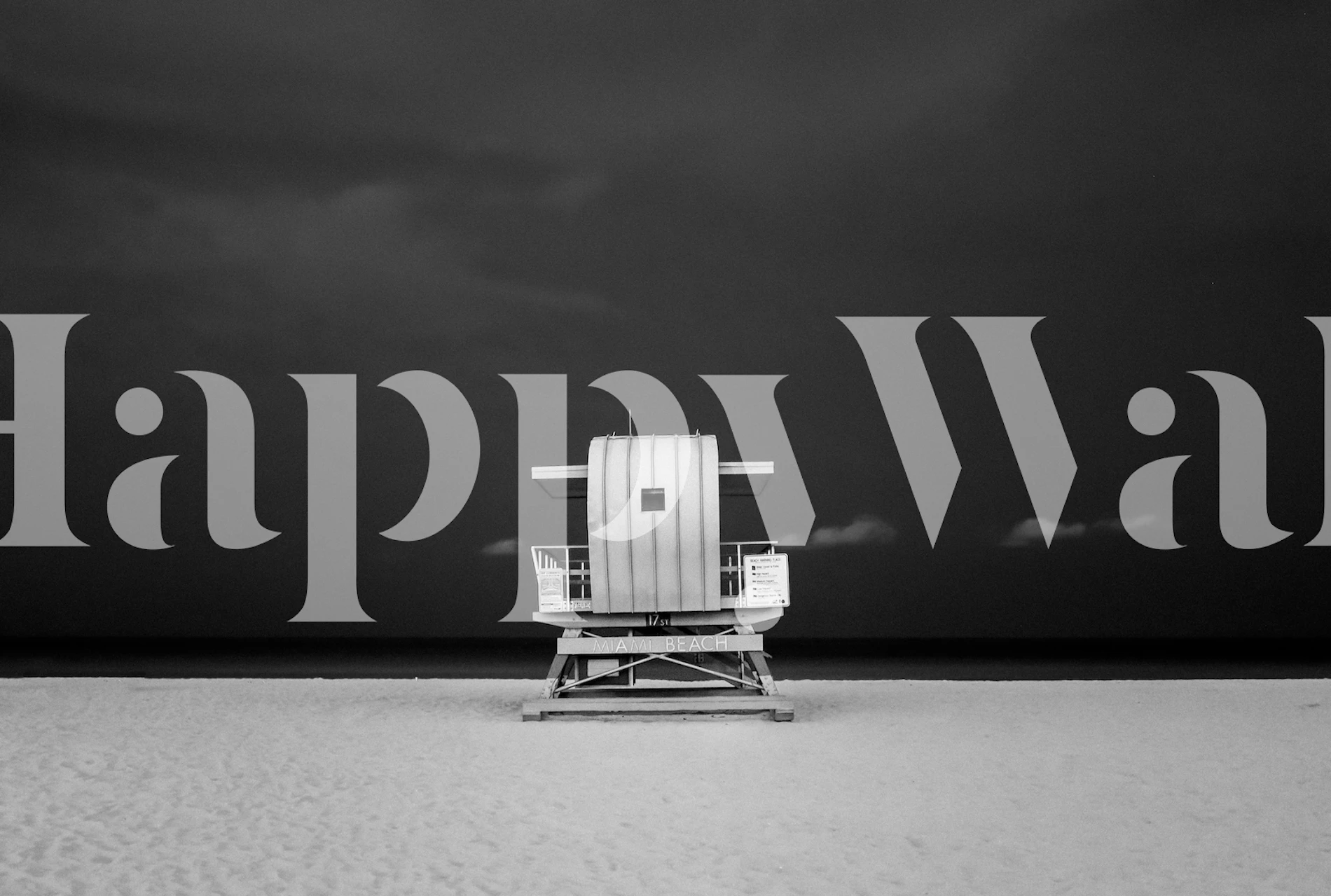 Black and white night scene of a lifeguard tower at Miami Beach wallpaper