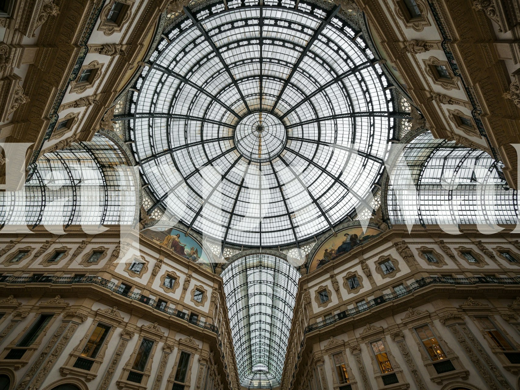 Dome architectural design with intricate details in white and gold wallpaper