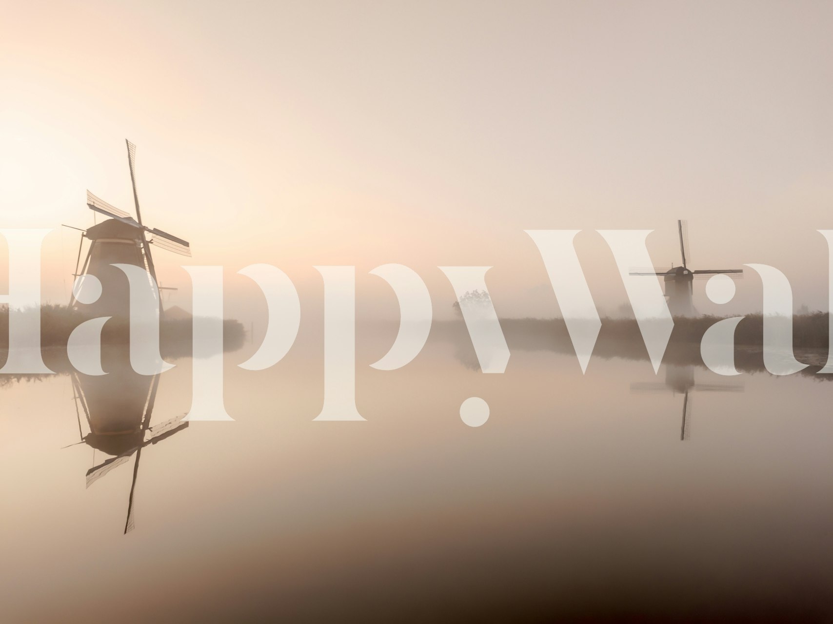 Dutch windmill landscape with soft colors and mist wallpaper