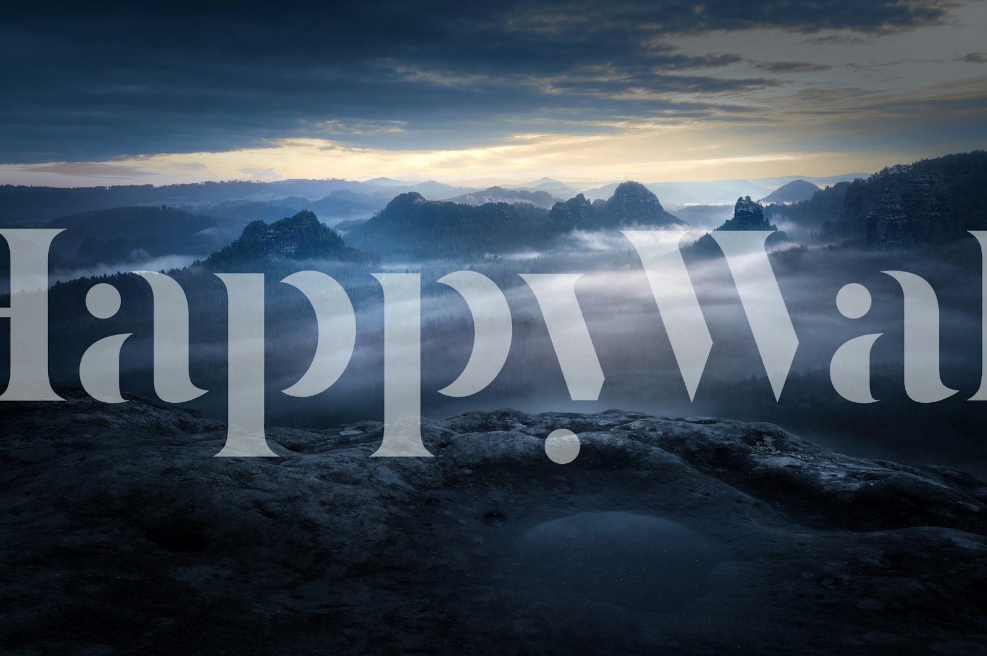 Mystical winter mountain landscape wall mural with serene haze