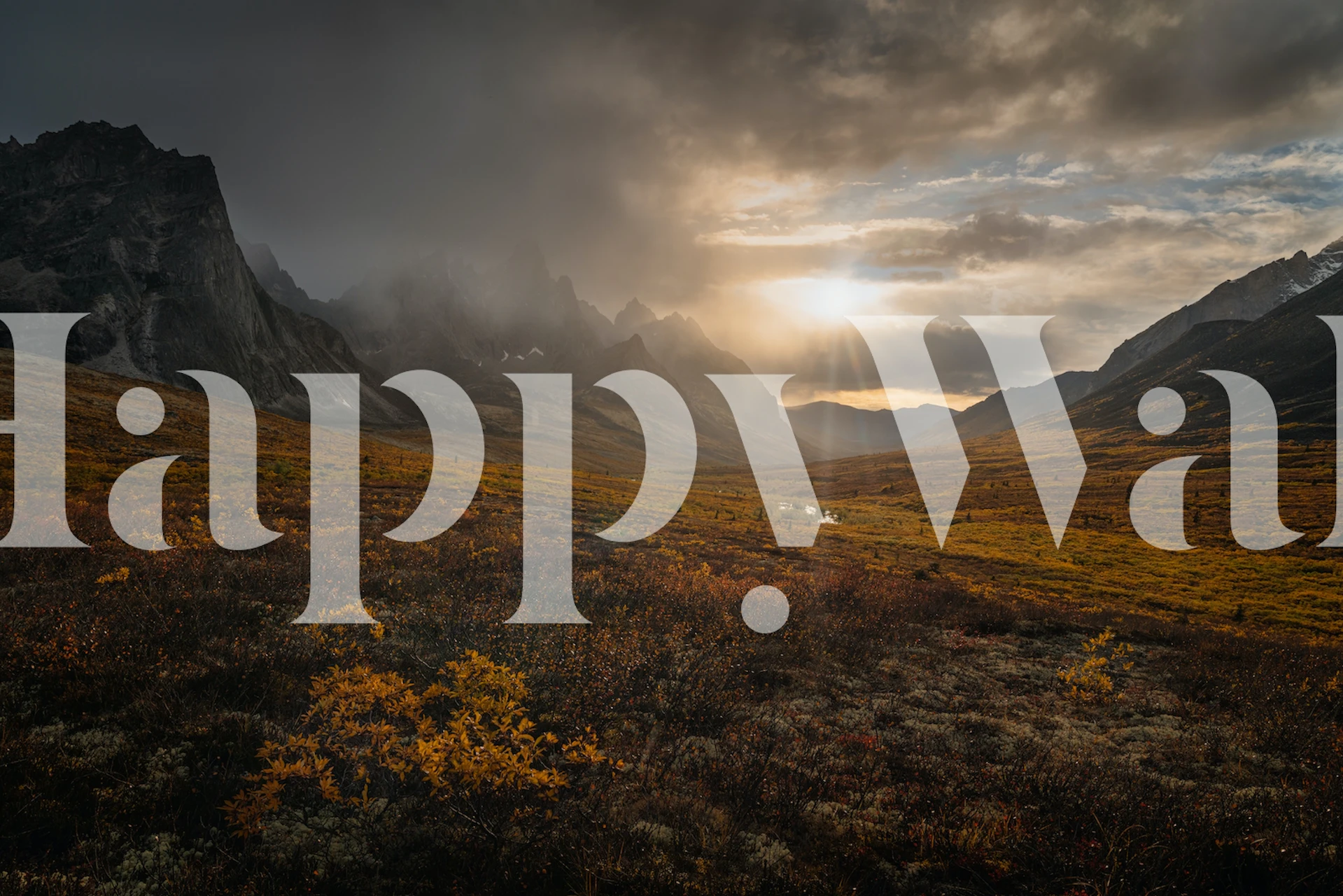 Mountain landscape featuring golden foliage and dramatic peaks wallpaper