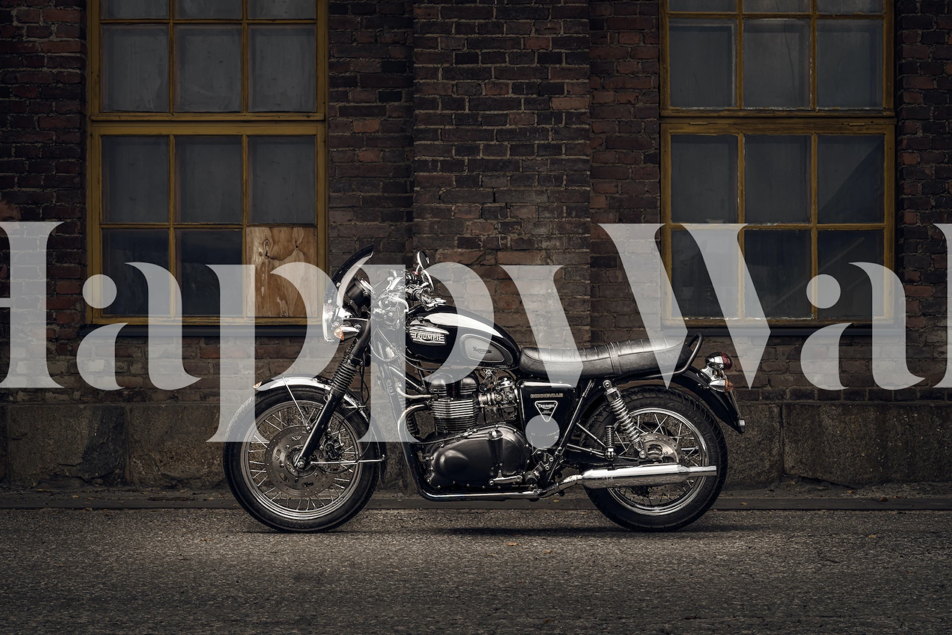 Vintage motorcycle wall mural against a brick wall backdrop