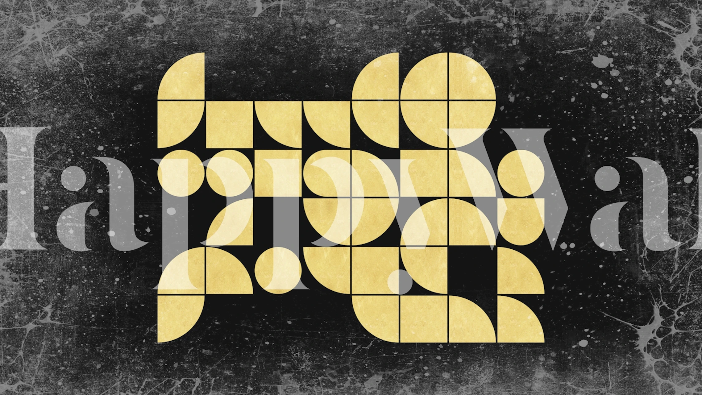 Geometric shapes in black and gold on textured wallpaper