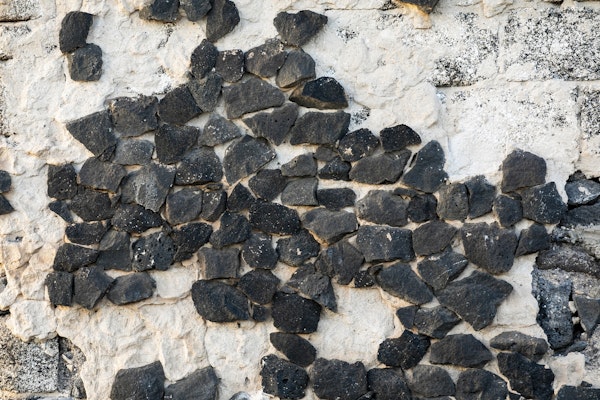 Black lava rock wall