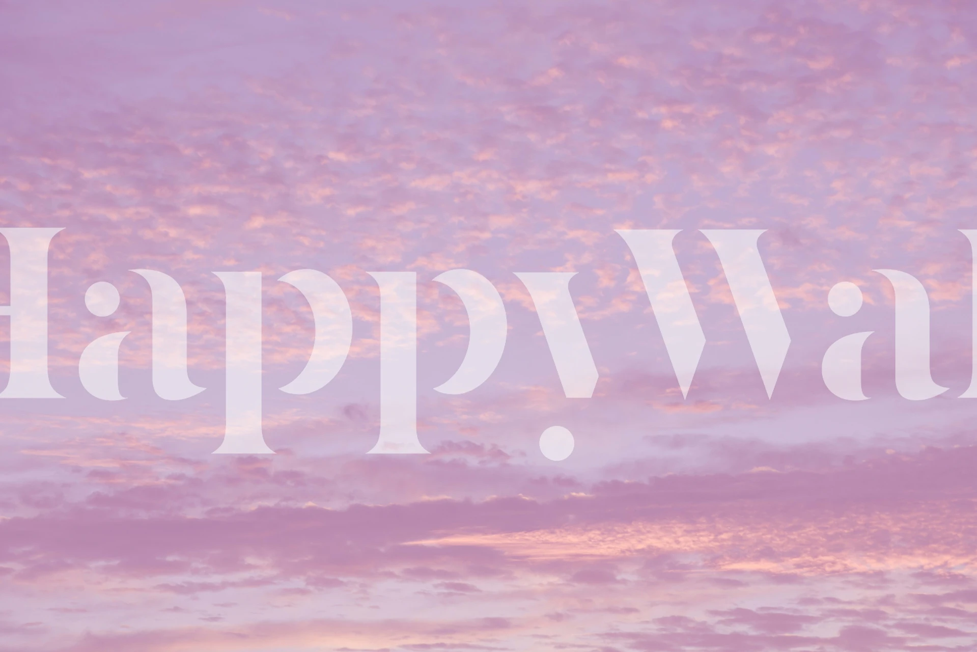 Soft pastel clouds in pink and purple hues wallpaper