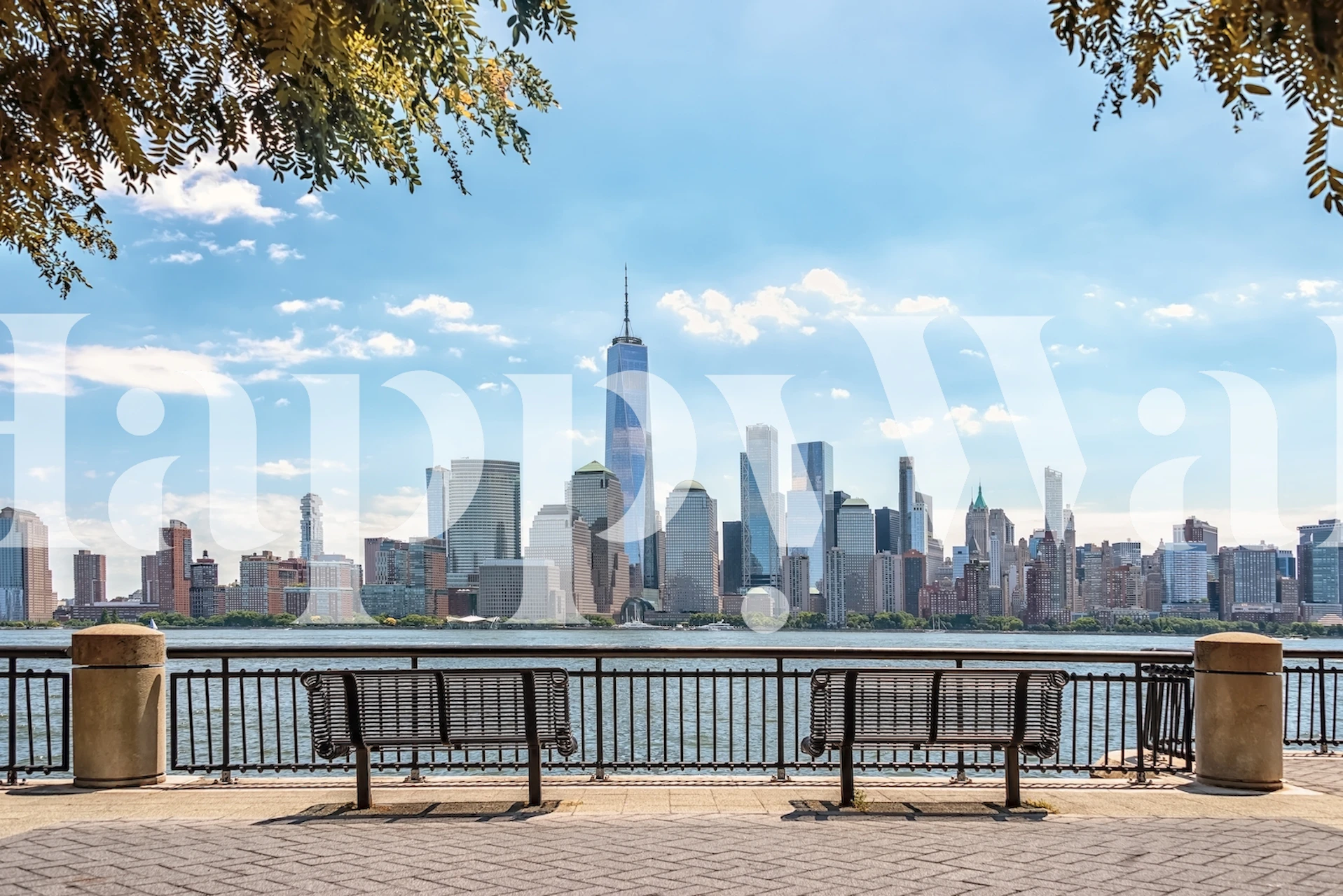 New York City skyline view with benches and a blue sky wallpaper