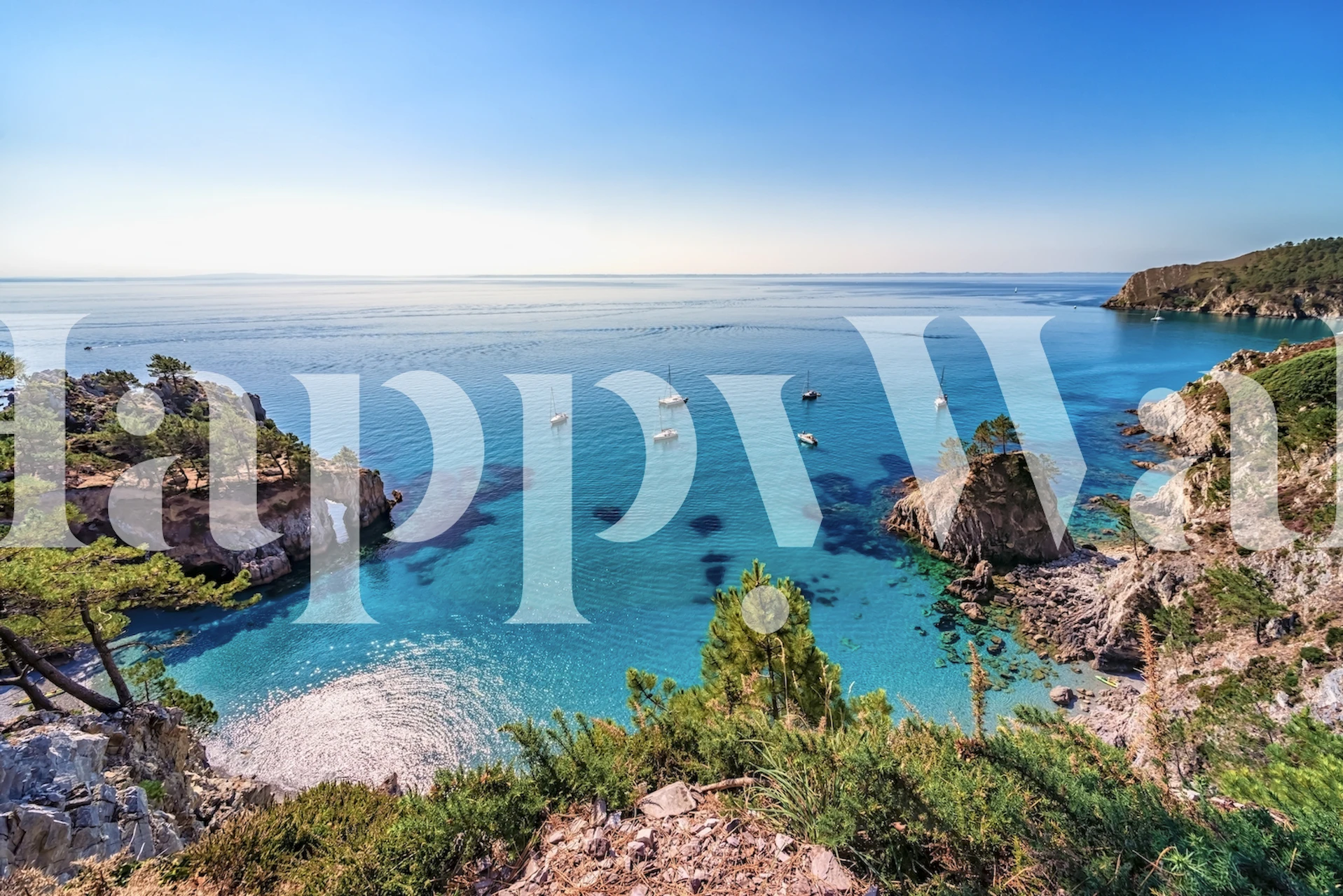 Ocean view with boats and green shoreline wallpaper