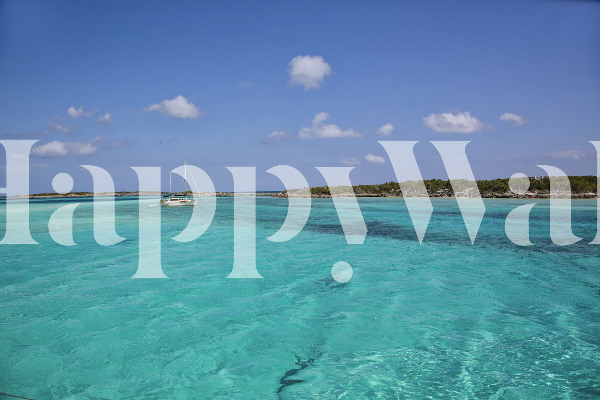 Tropical turquoise water with a boat and blue sky wallpaper