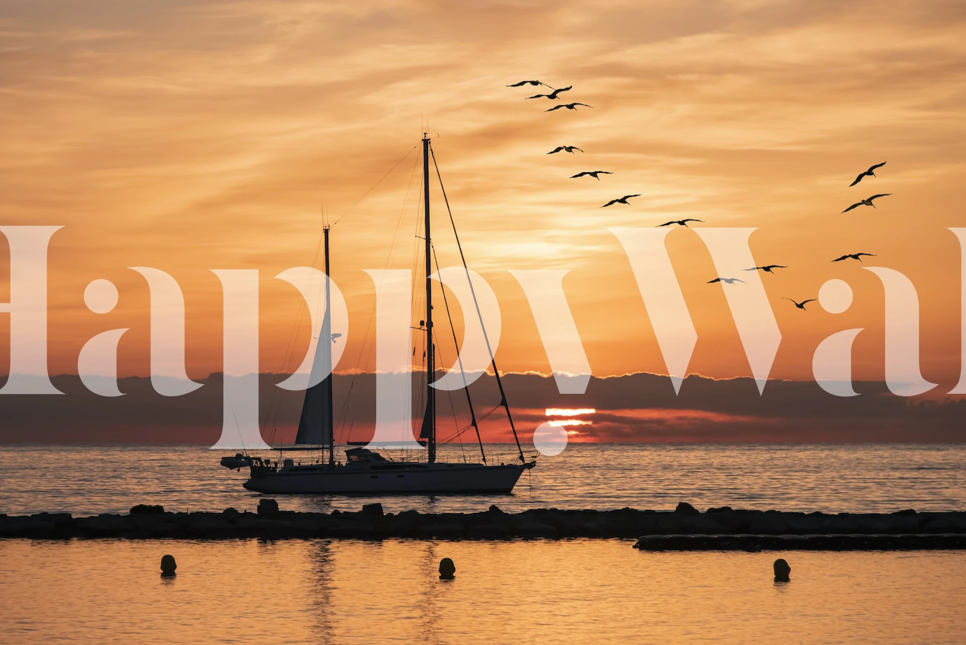 Sailboat silhouette against a sunset backdrop with flying birds over the sea wall mural