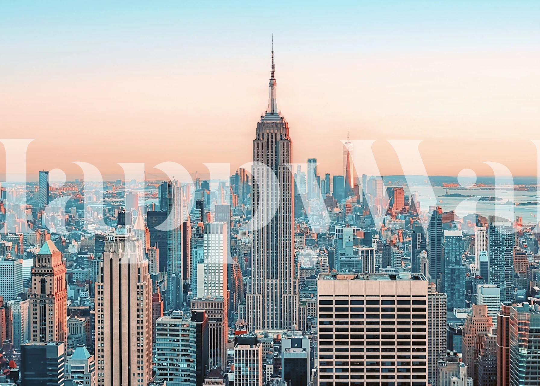 City skyline wallpaper featuring skyscrapers in soft pink and blue hues at sunset