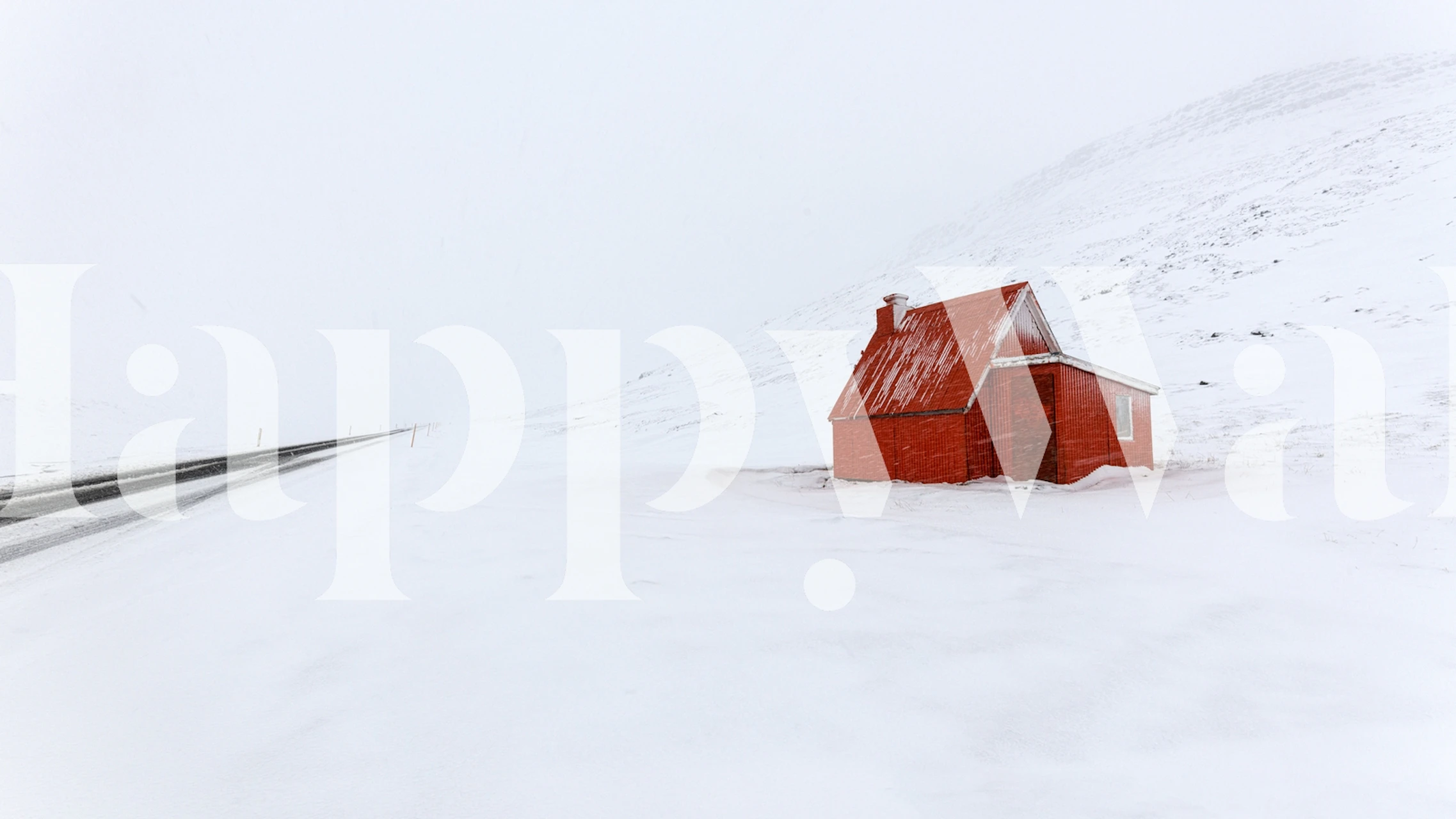 Red little house in a snowy landscape wall mural