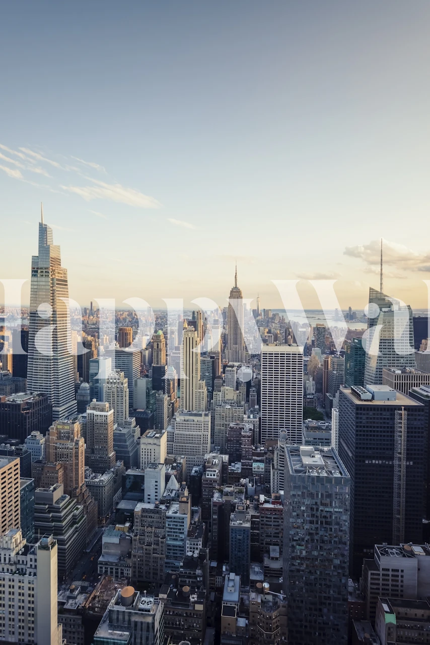 Manhattan skyline at dusk with golden sunlight wall mural