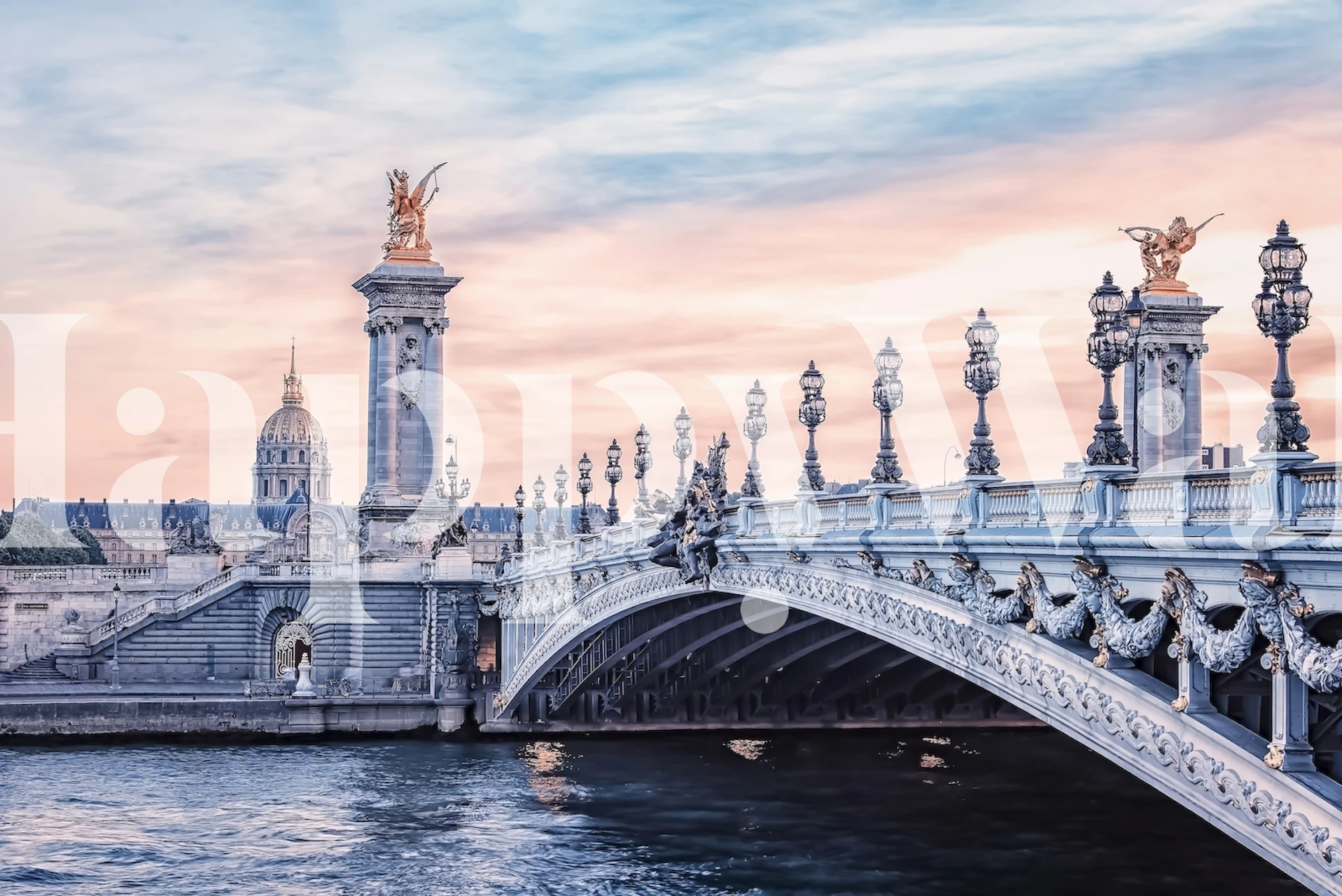 Scenic Parisian bridge with golden statues and blue sky wallpaper