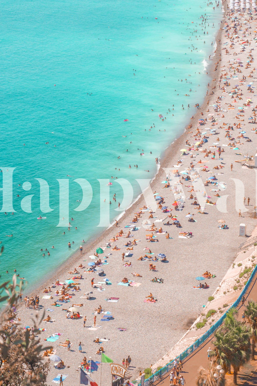 Aerial view of a tropical beach with turquoise water, sandy shore, and colorful beach umbrellas wallpaper.