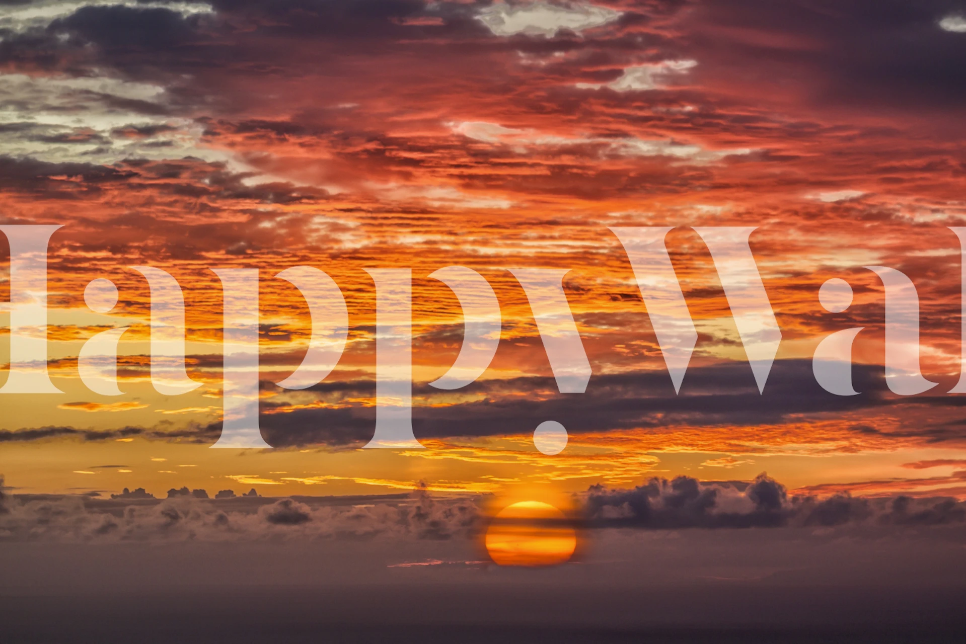 Sunrise over the ocean Tapete in einem Raum