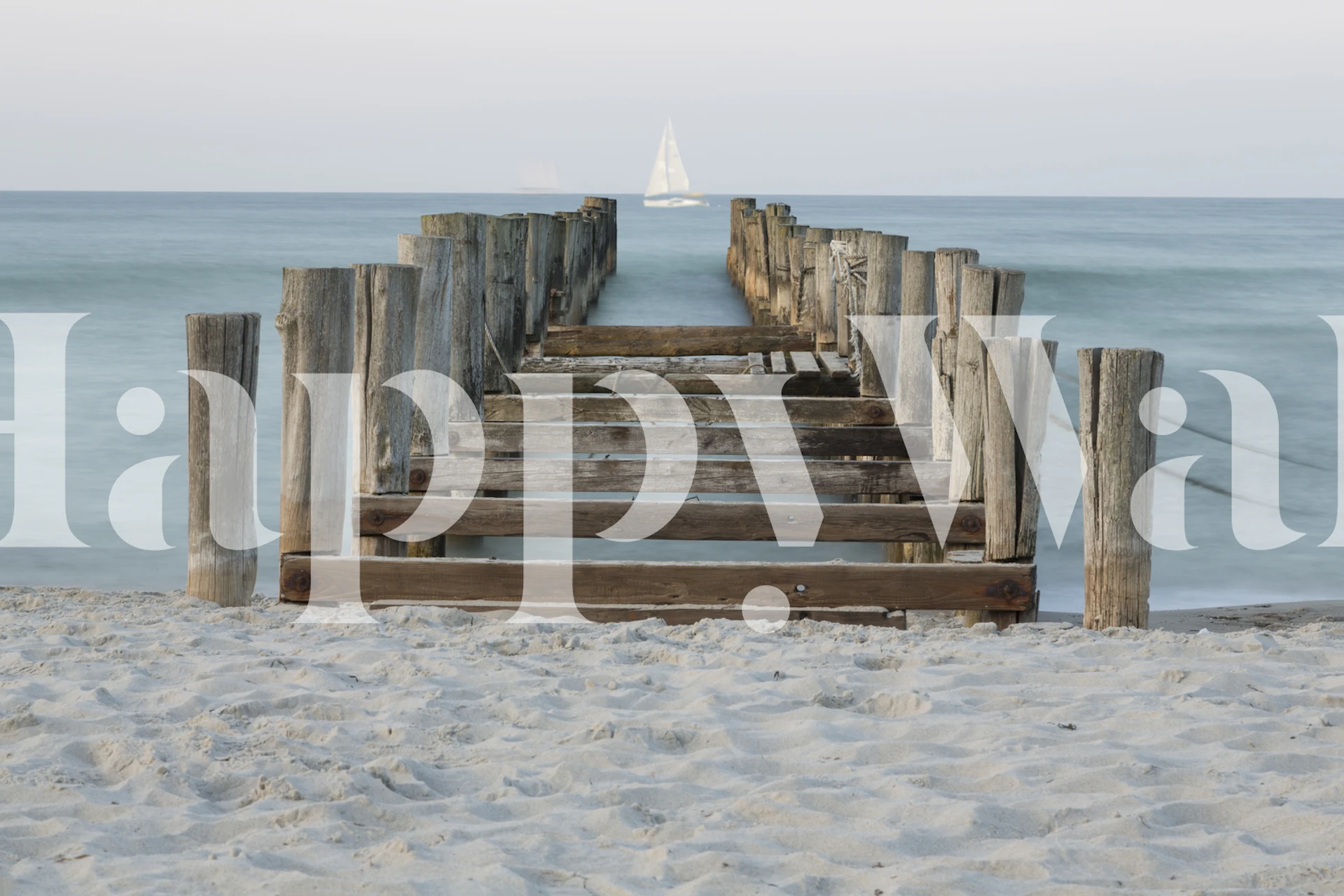 Wooden jetty extending into serene waters wall mural