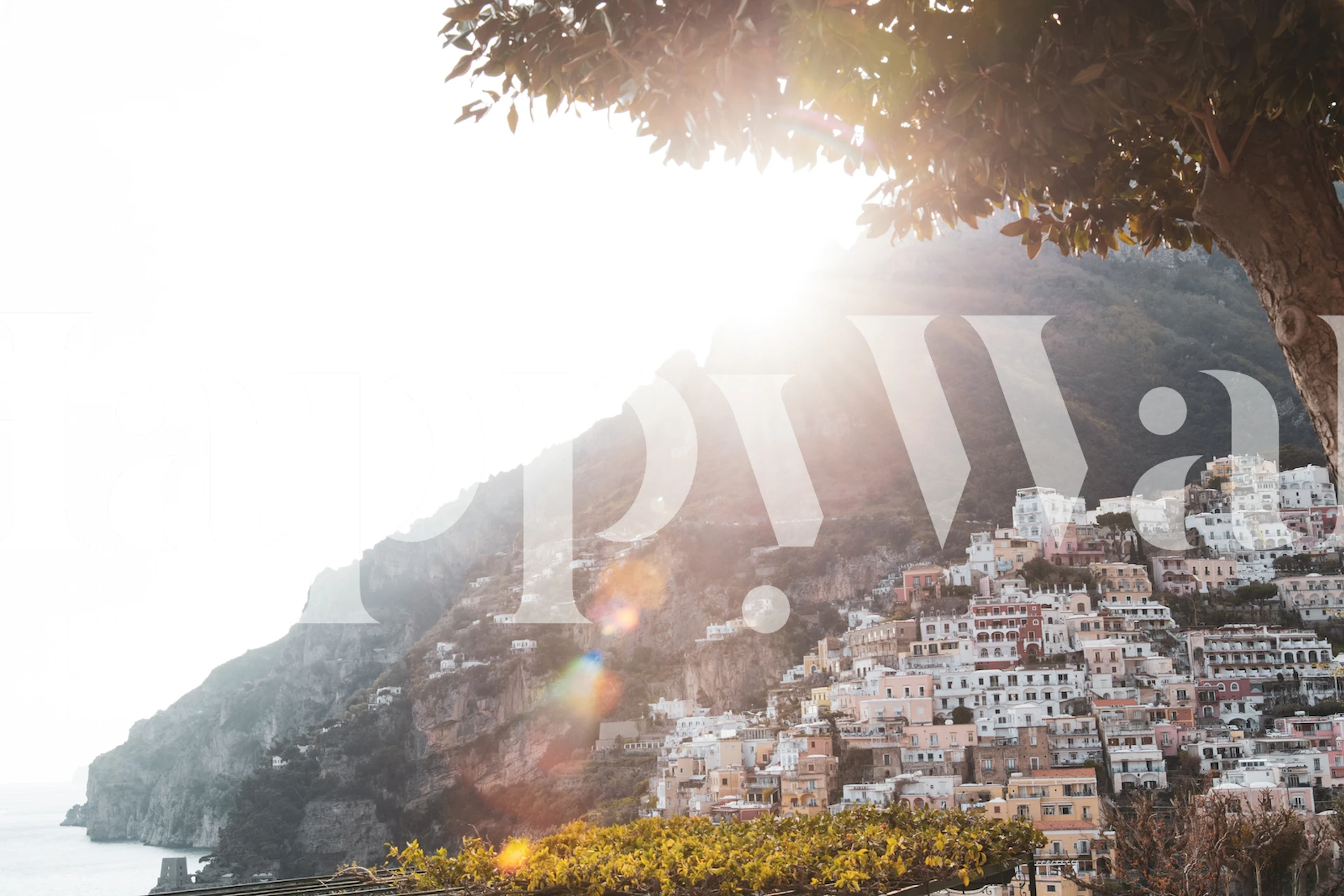 Sunlit Positano coastal landscape wall mural