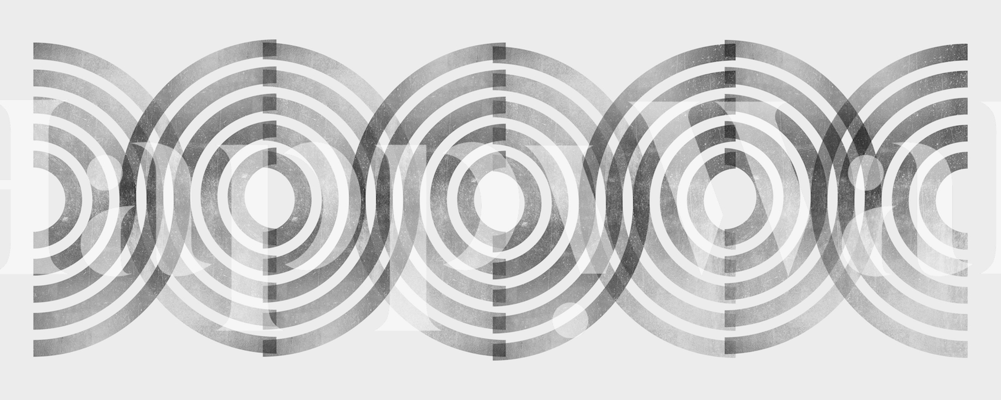 Silver concentric circles wall mural creating an optical illusion