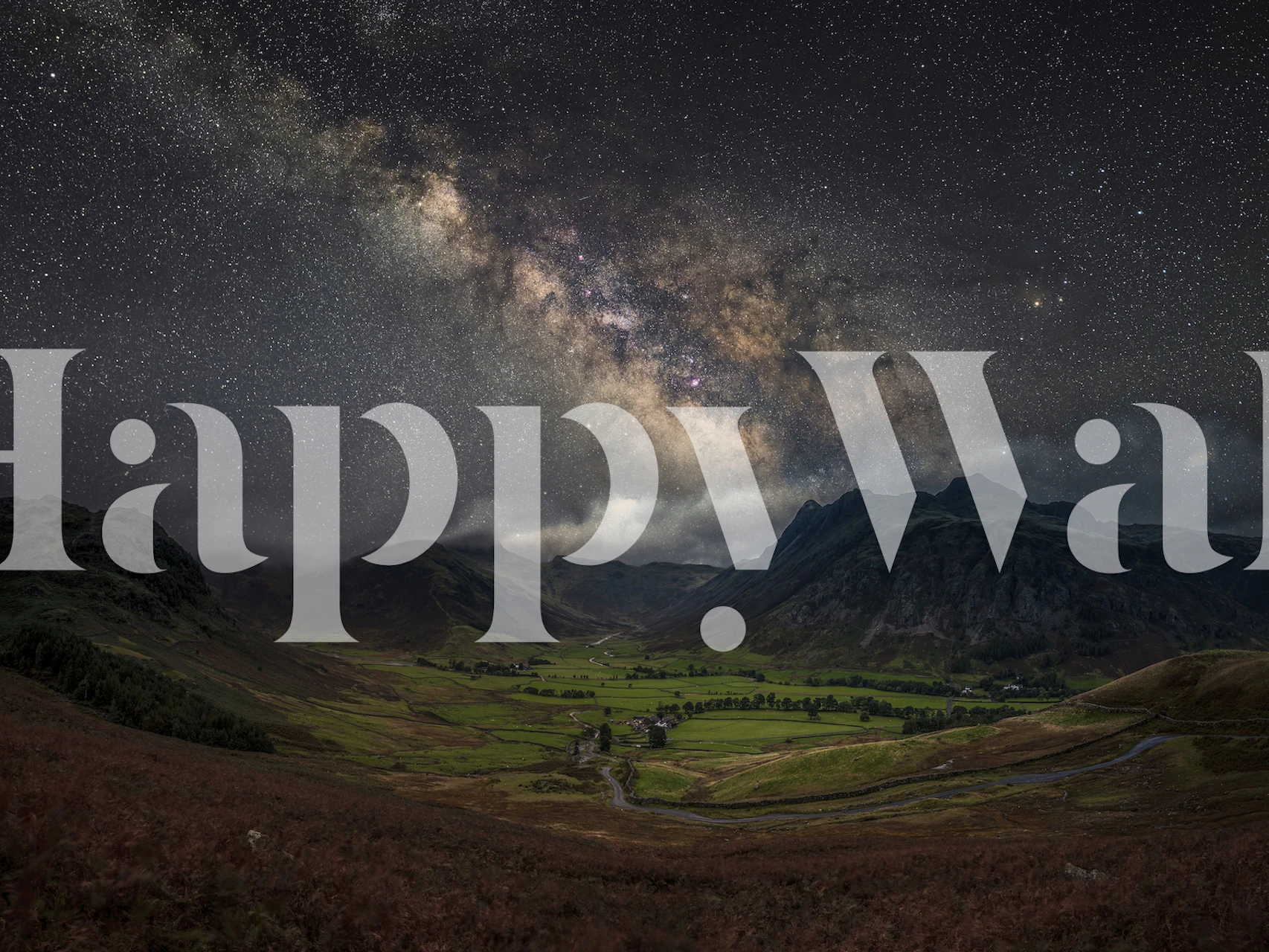 Milky Way and starry night sky over mountains wallpaper