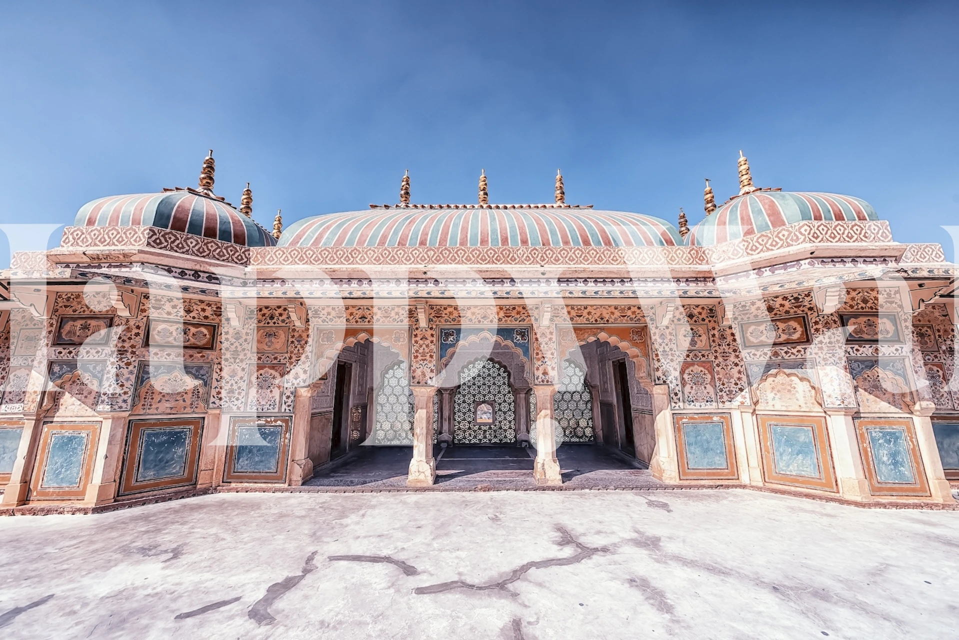 Intricate patterned architecture in warm colors wallpaper