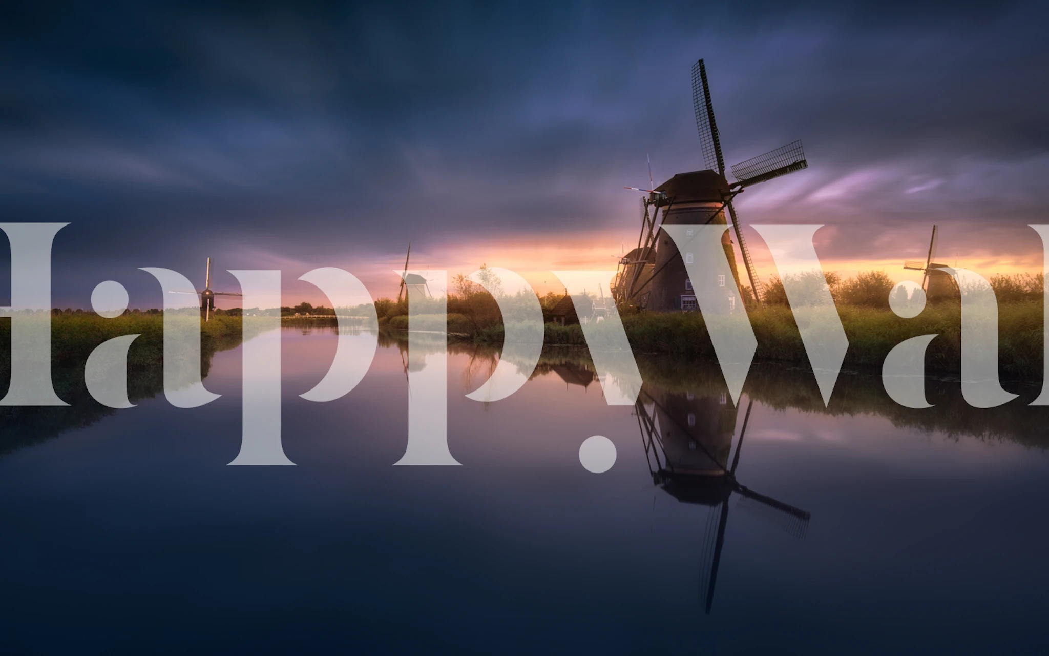 Kinderdijk Windmills wall mural with a sunset backdrop, reflecting in the calm water