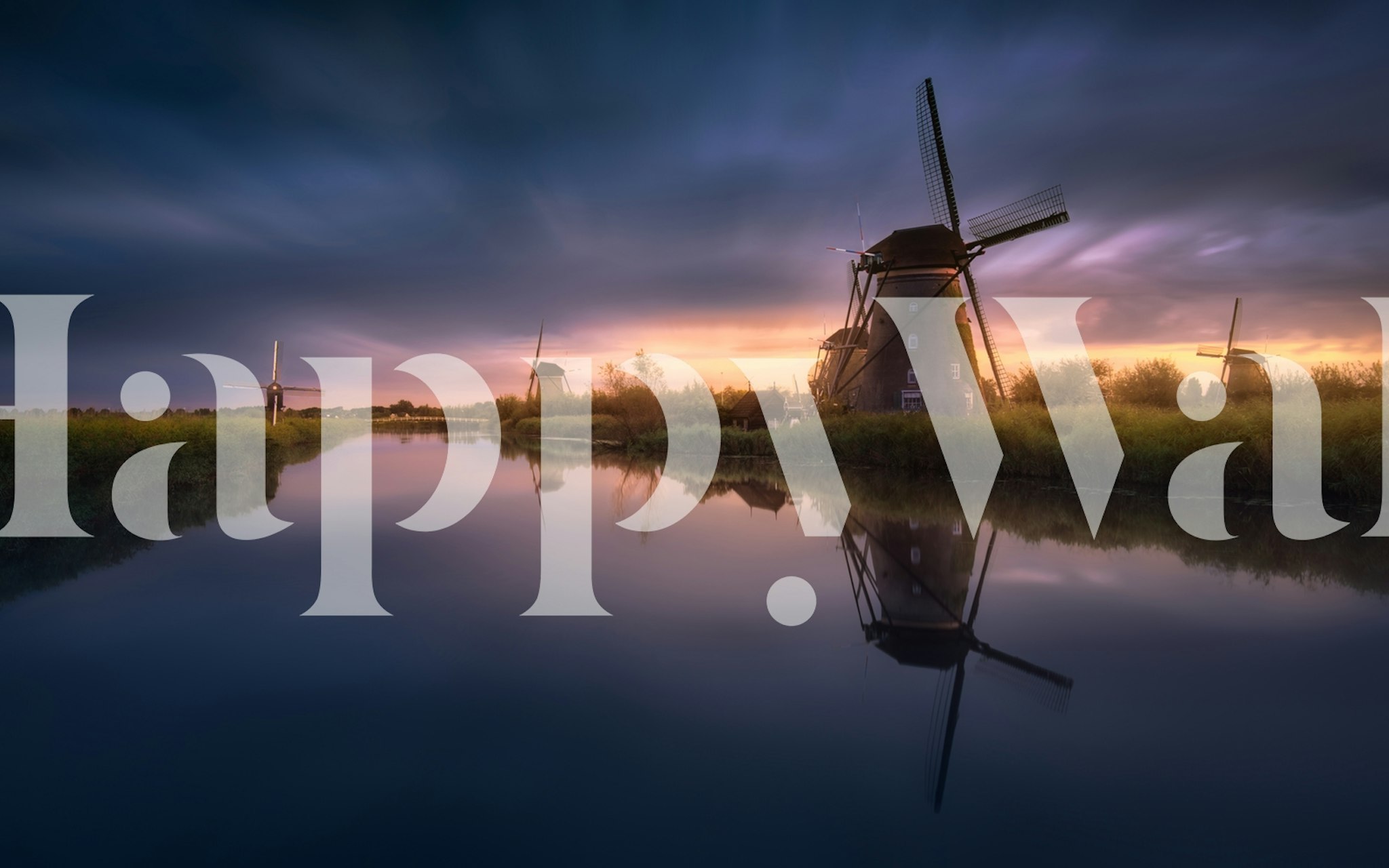 Kinderdijk Windmills wall mural with a sunset backdrop, reflecting in the calm water