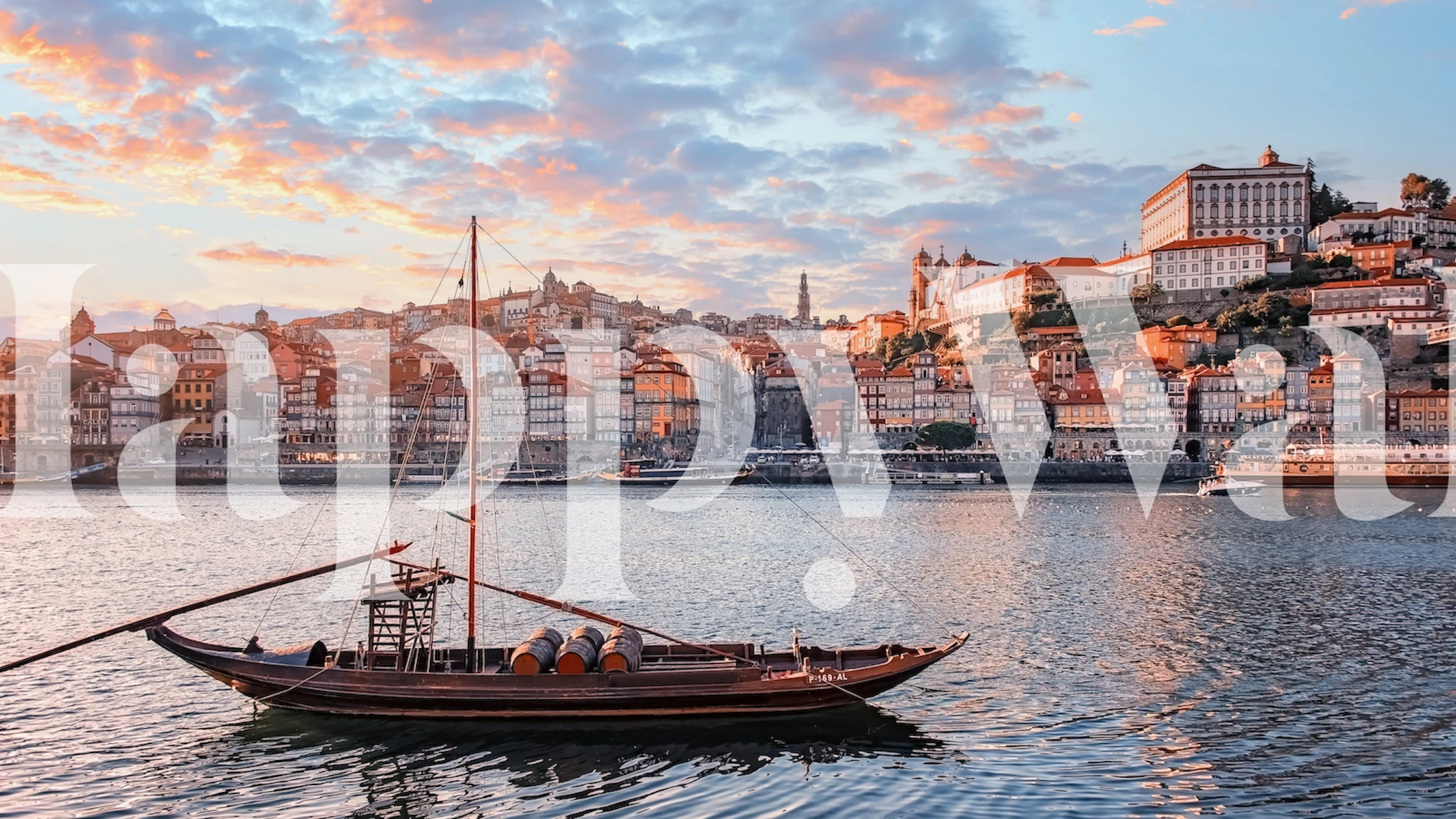 Porto skyline at sunset with river and boat wallpaper