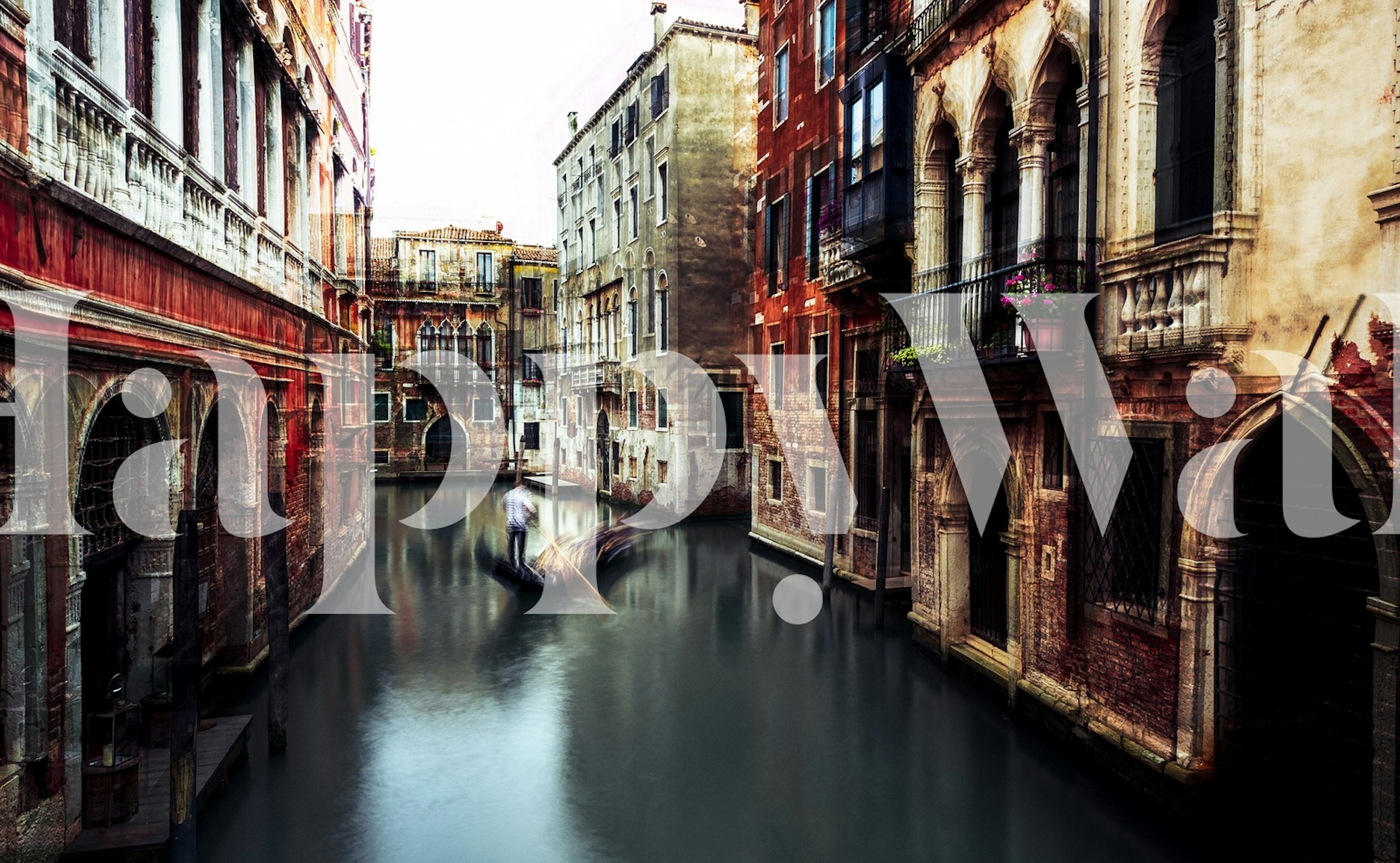 Venice canal scene with historic buildings and gondola wallpaper