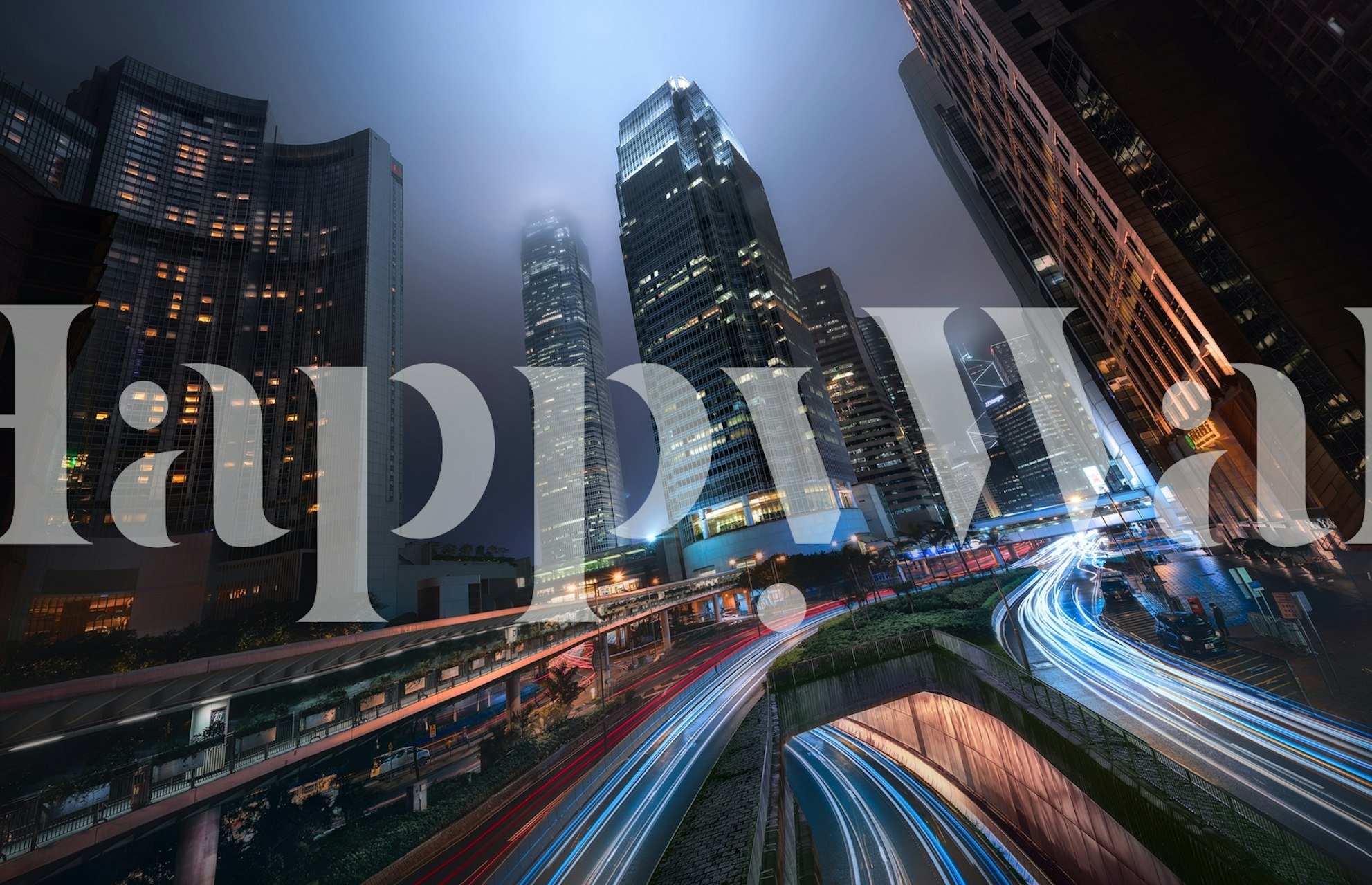City skyline at night with light trails and fog wallpaper