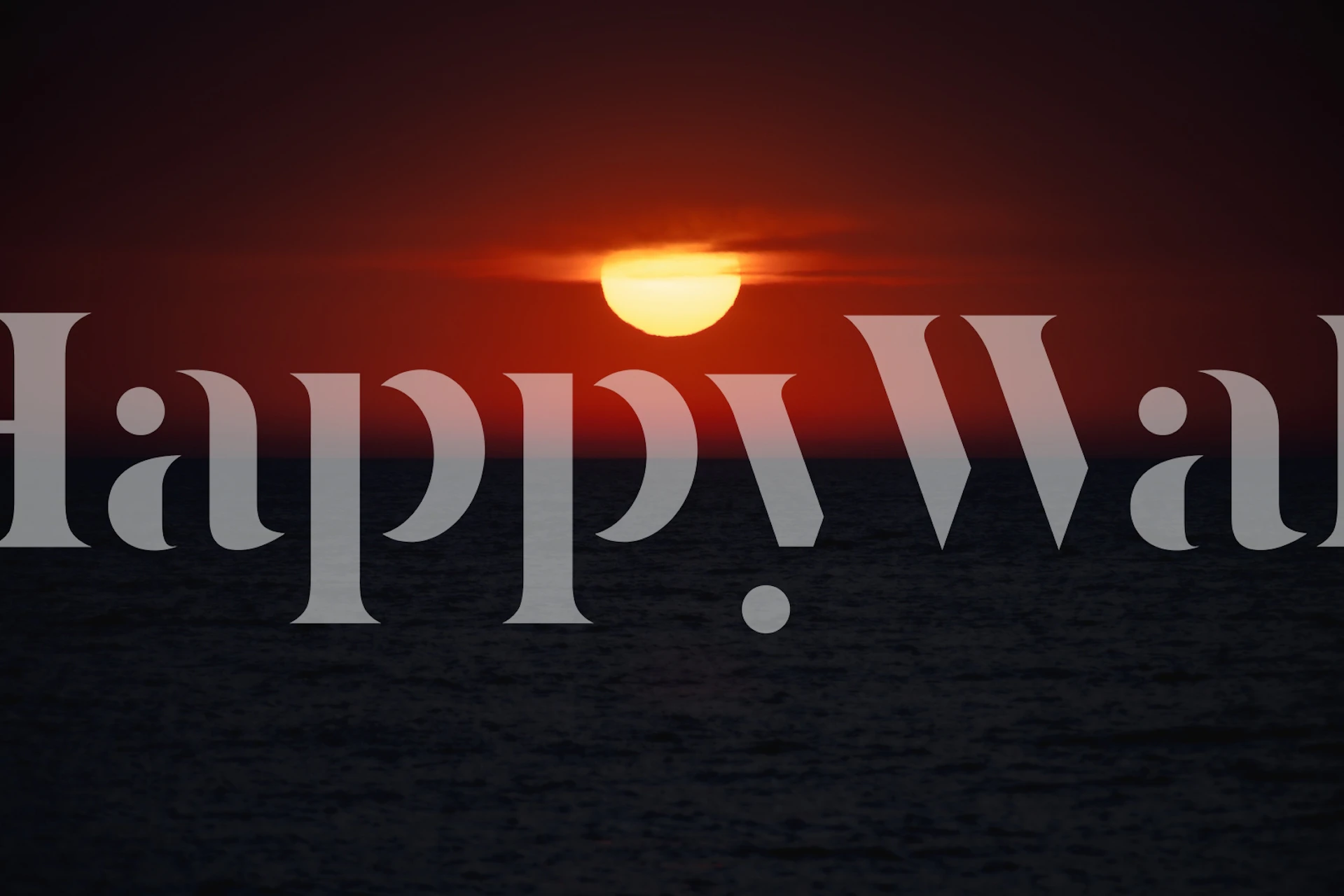 Sunset over the ocean with gradient sky colors wallpaper