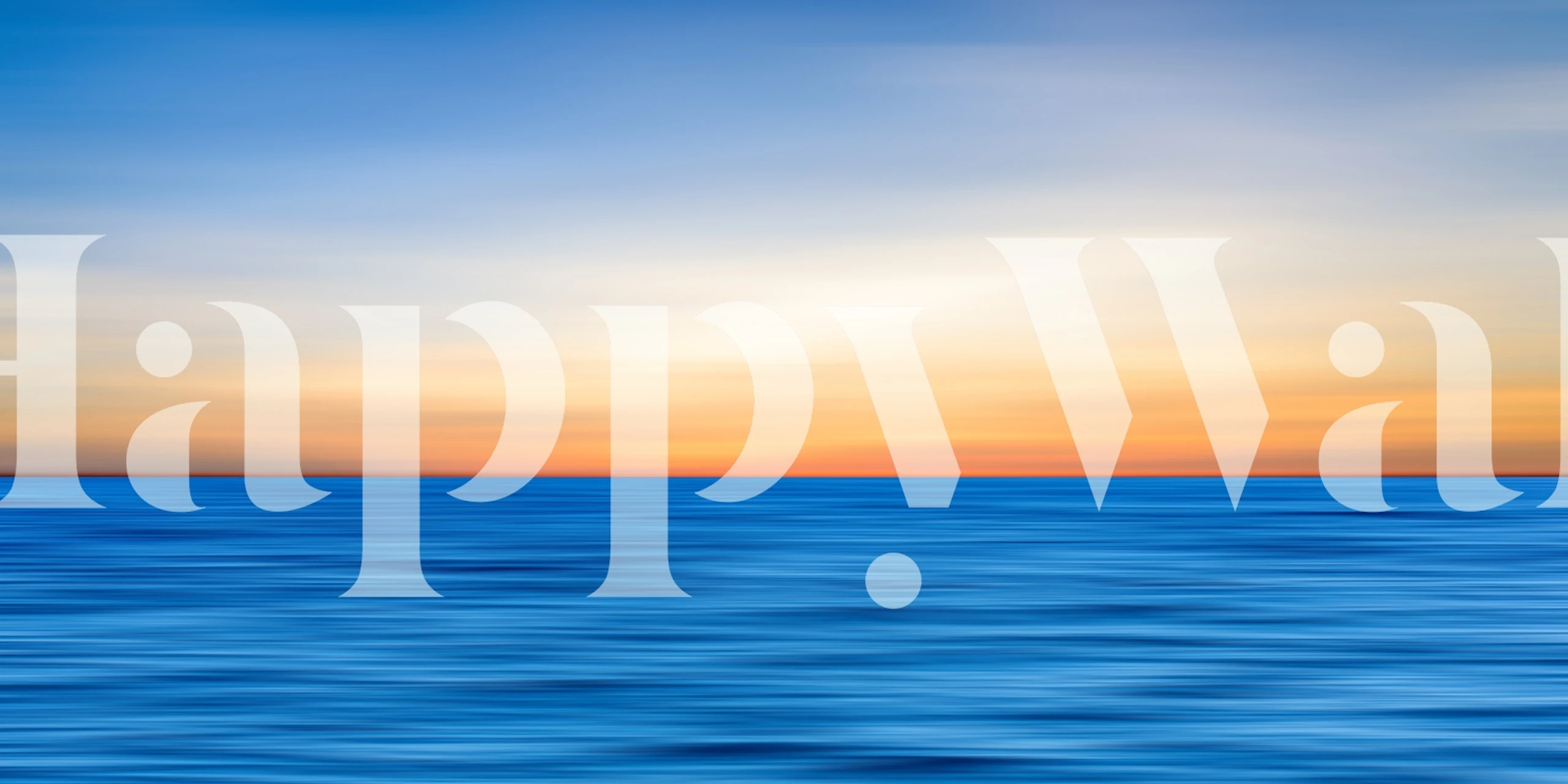Blurry ocean waves under a sunset sky, blue and orange gradient wallpaper