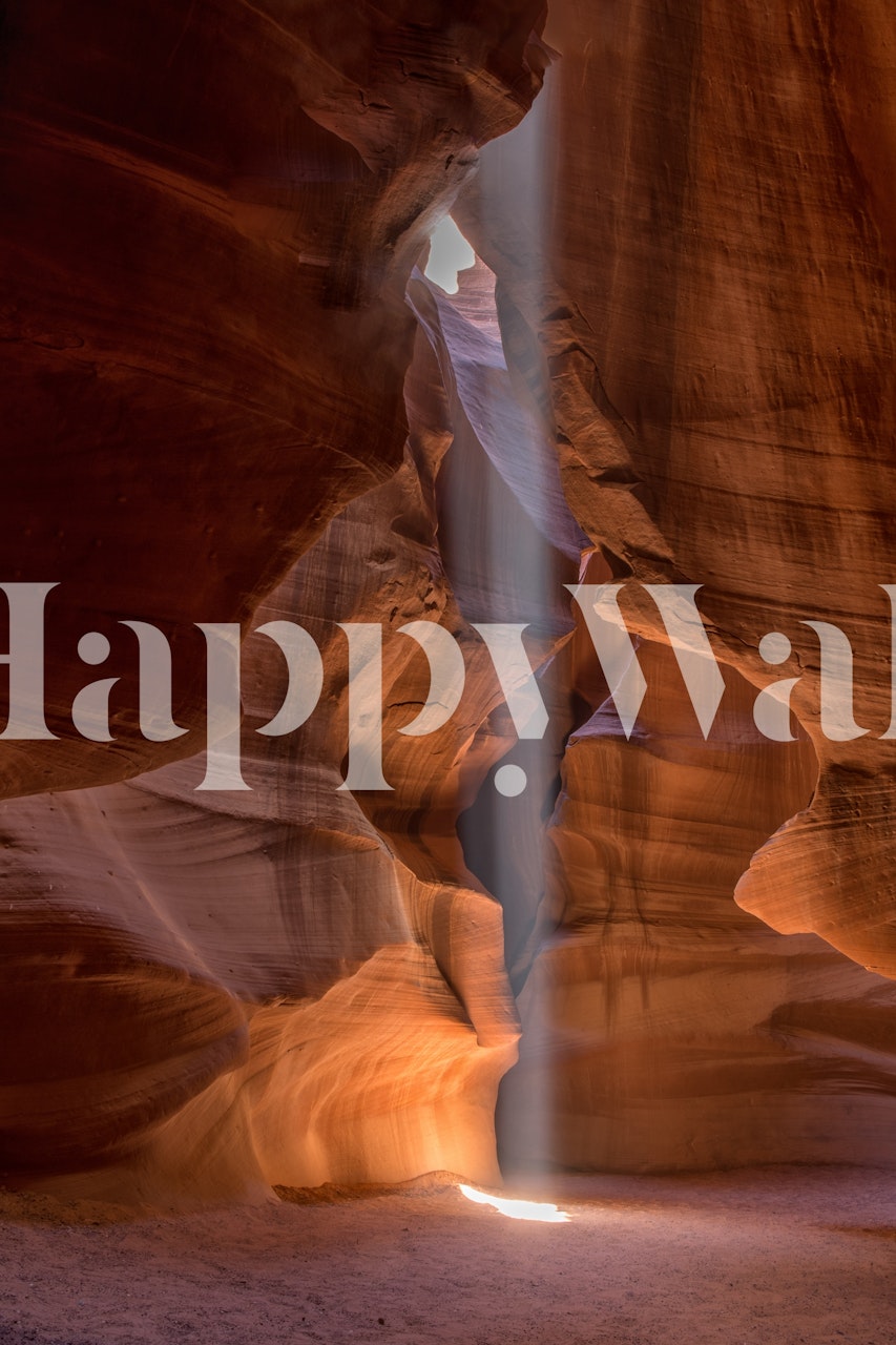 Canyon light beam shining through rock formation wallpaper