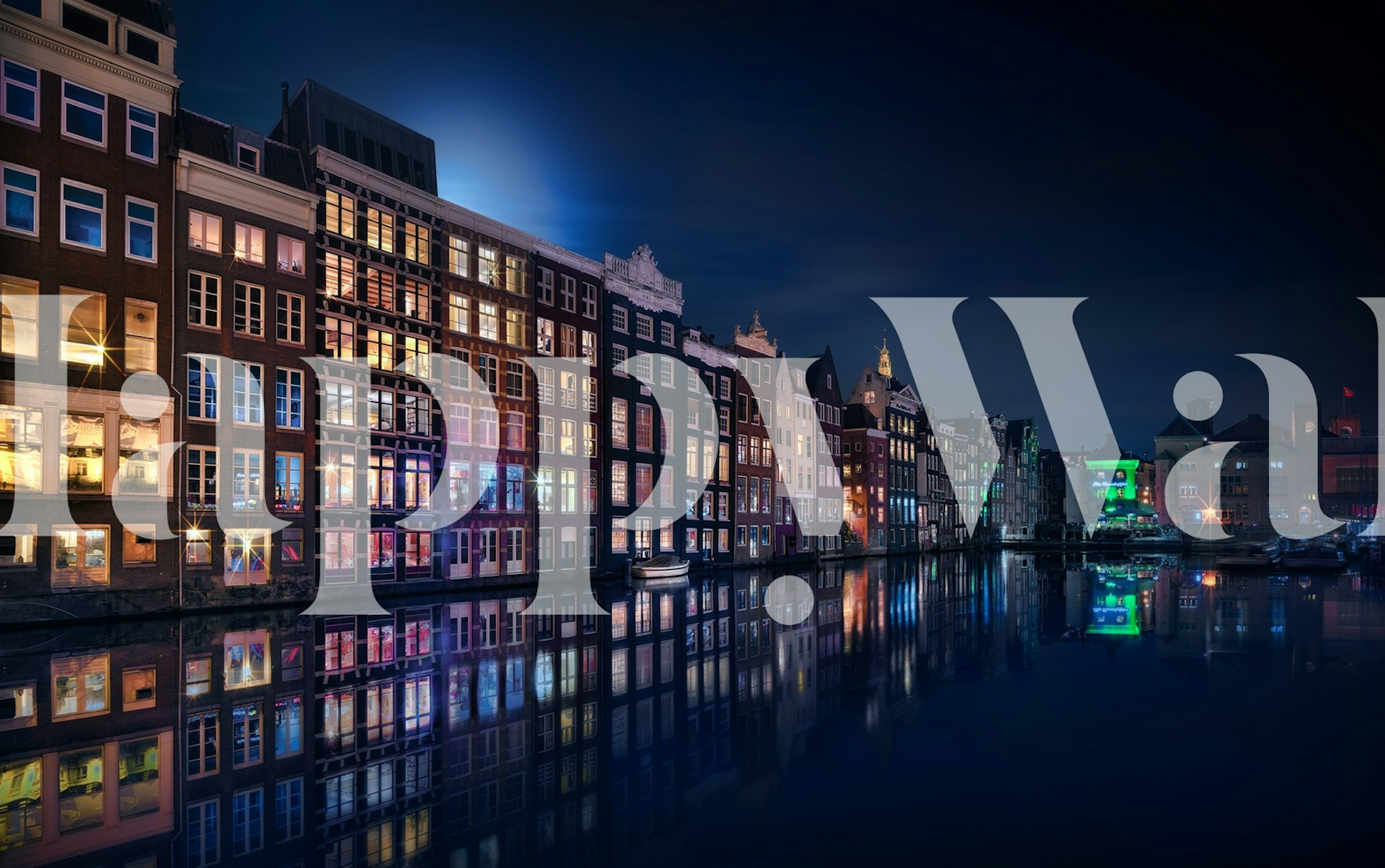 Colorful waterfront buildings at night reflecting in water wallpaper