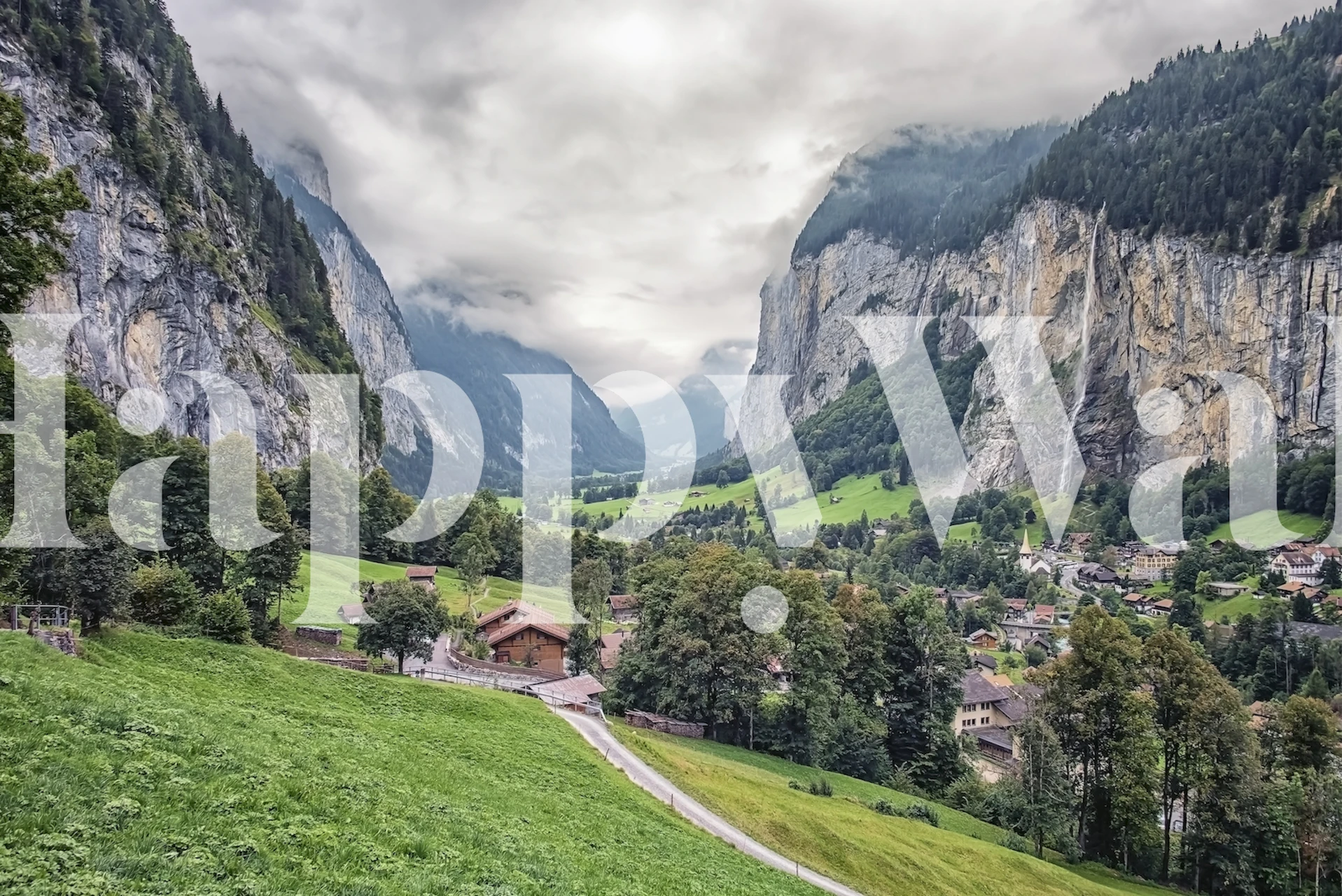 Lauterbrunnen valley scene wallpaper with mountains and trees