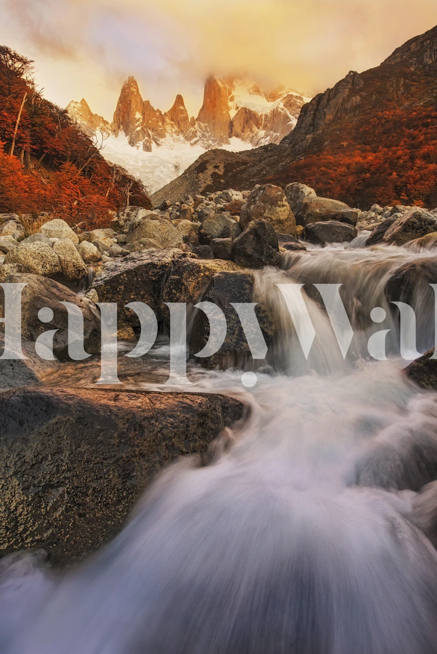 Wall mural of an autumnal landscape with flowing river and golden-hued foliage